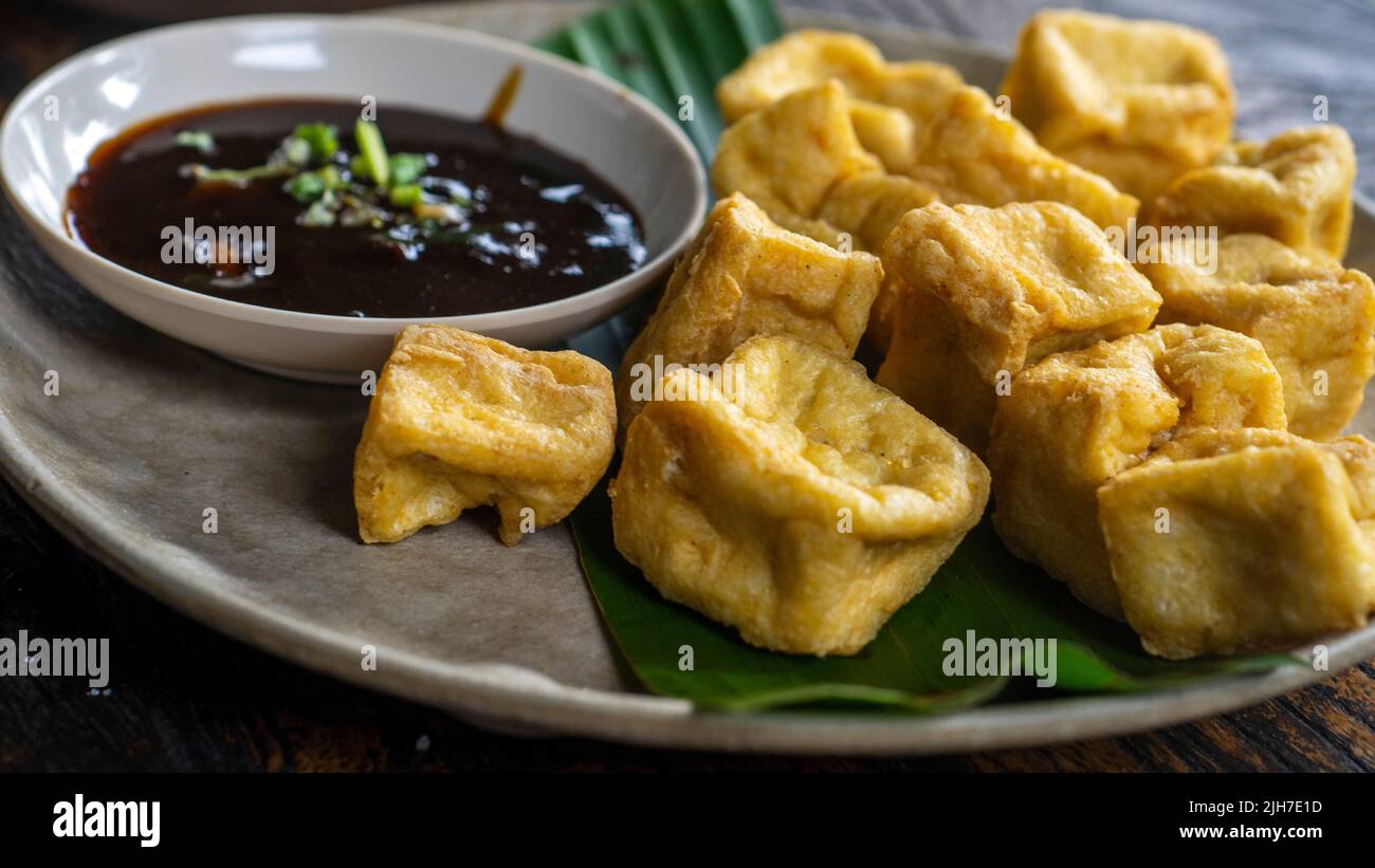 Tahu Goreng is popular street food of deep fried bean curd from