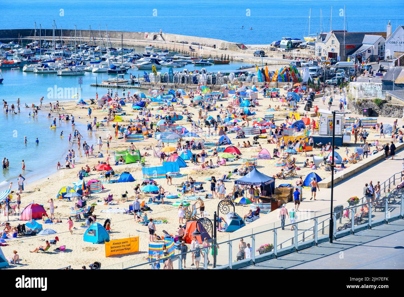 Lyme Regis, Dorset, UK. 16th July, 2022. UK Weather Crowds flock to