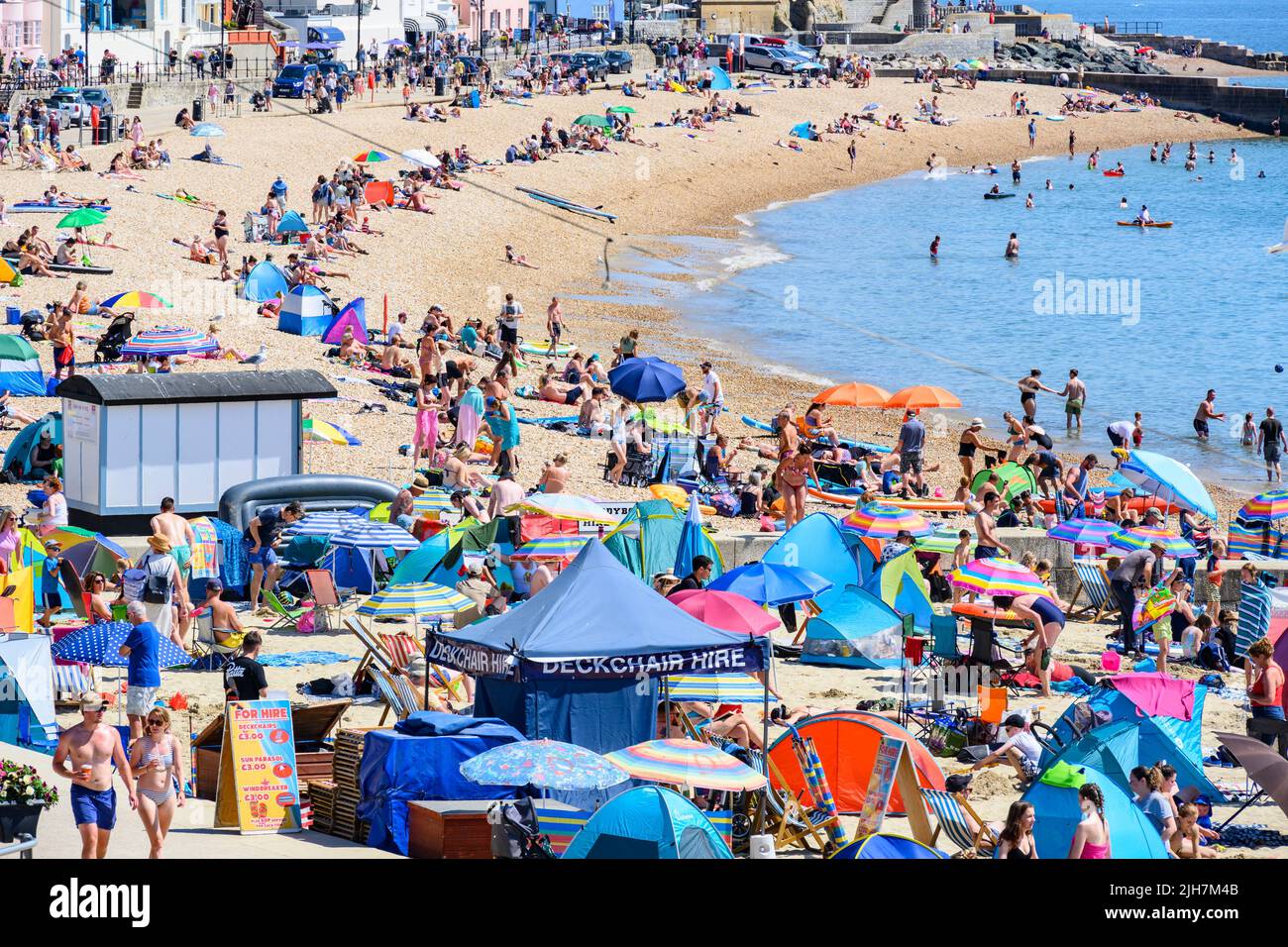 Lyme Regis, Dorset, UK. 16th July, 2022. UK Weather Crowds flock to