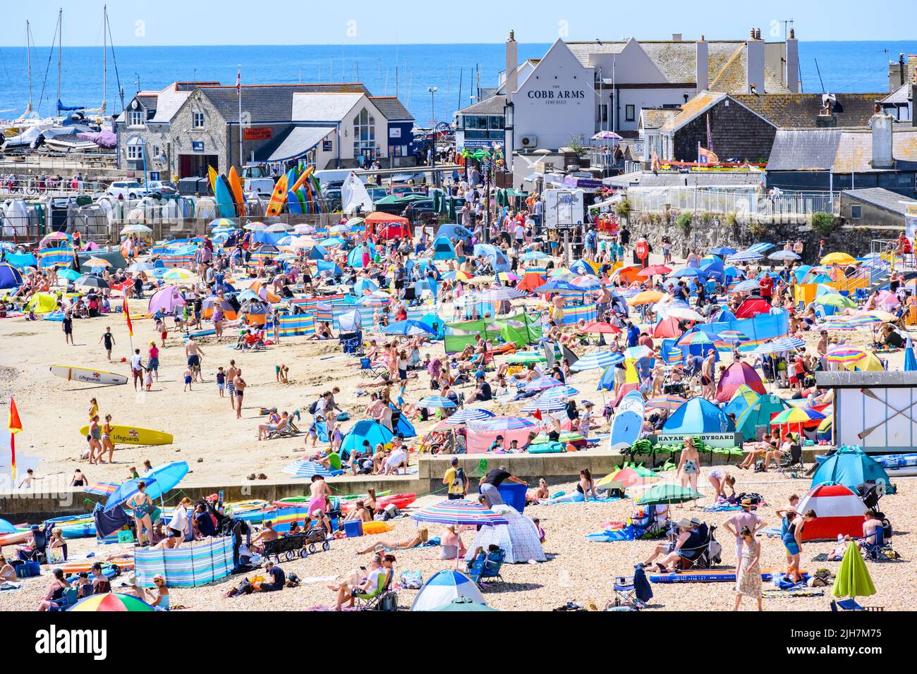 Lyme Regis, Dorset, UK. 16th July, 2022. UK Weather Crowds flock to