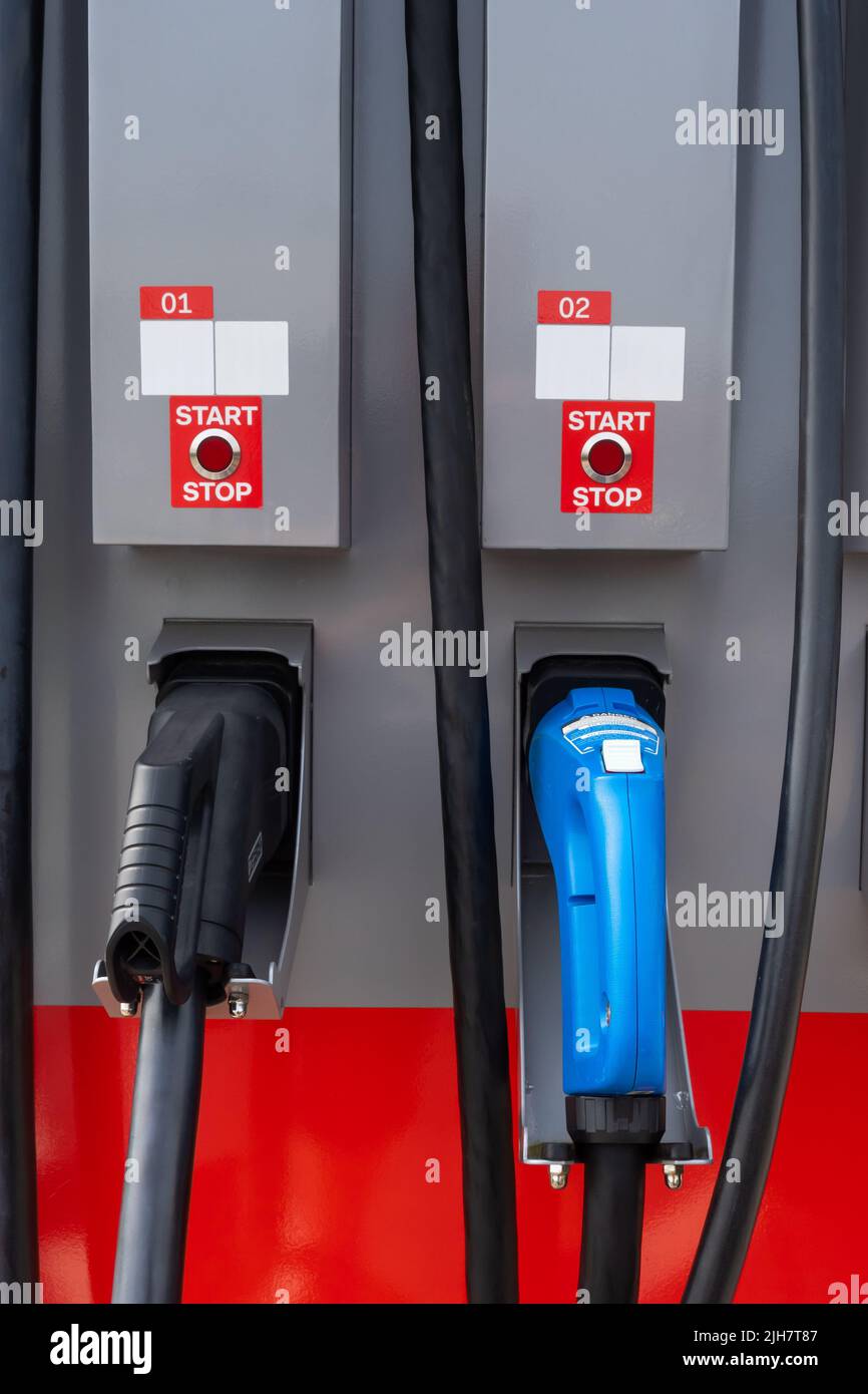 Fast charging plugs at public electric car charging stations. Electromobility in everyday life