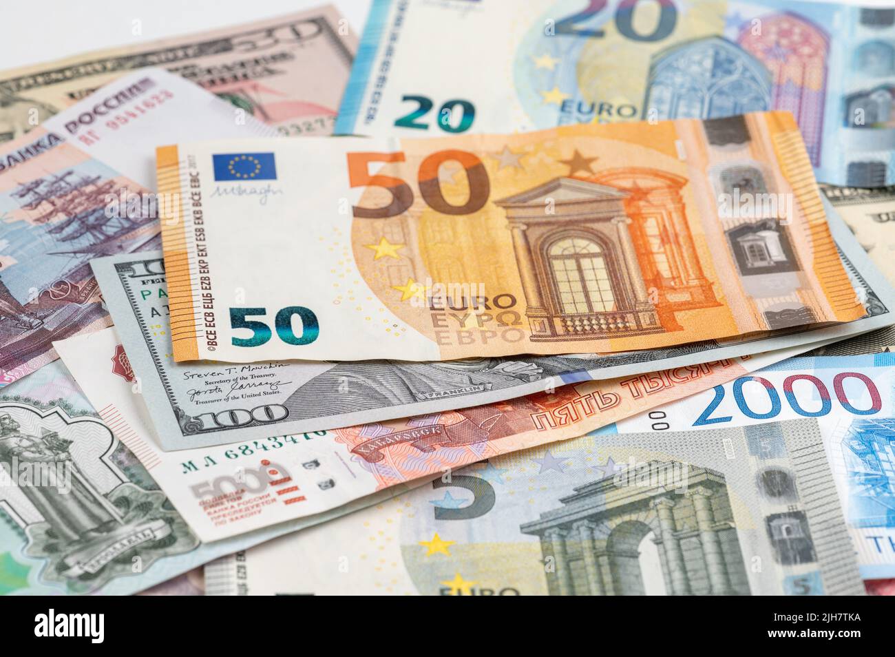 Money from different countries: dollars, euros, rubles. International currencies background. Stock Photo