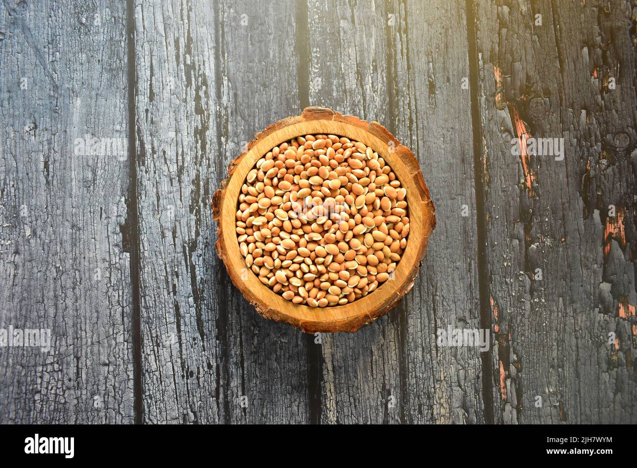 Raw whole dried brown Hyacinth bean Stock Photo