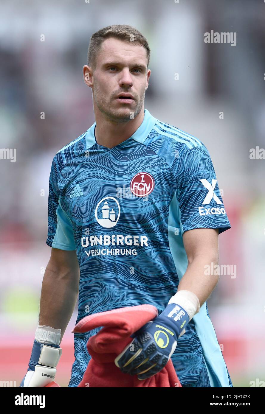 Germany. 16th July, 2022. 16 July 2022, Hamburg: Soccer: 2nd Bundesliga, Matchday 1, Hamburg, Millerntor-Stadion, FC St. Pauli - 1. FC Nürnberg, Nürnberg's goalkeeper Christian Mathenia shows his disappointment after conceding three goals. Photo: Michael Schwartz/dpa - IMPORTANT NOTE: In accordance with the requirements of the DFL Deutsche Fußball Liga and the DFB Deutscher Fußball-Bund, it is prohibited to use or have used photographs taken in the stadium and/or of the match in the form of sequence pictures and/or video-like photo series. Credit: dpa picture alliance/Alamy Live News Stock Photo