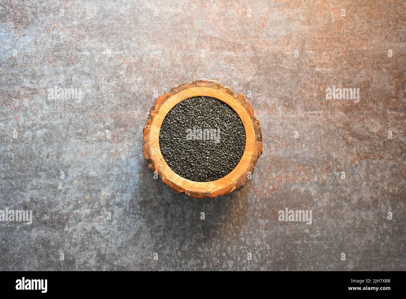 Raw whole dried black sesame seed Stock Photo Alamy