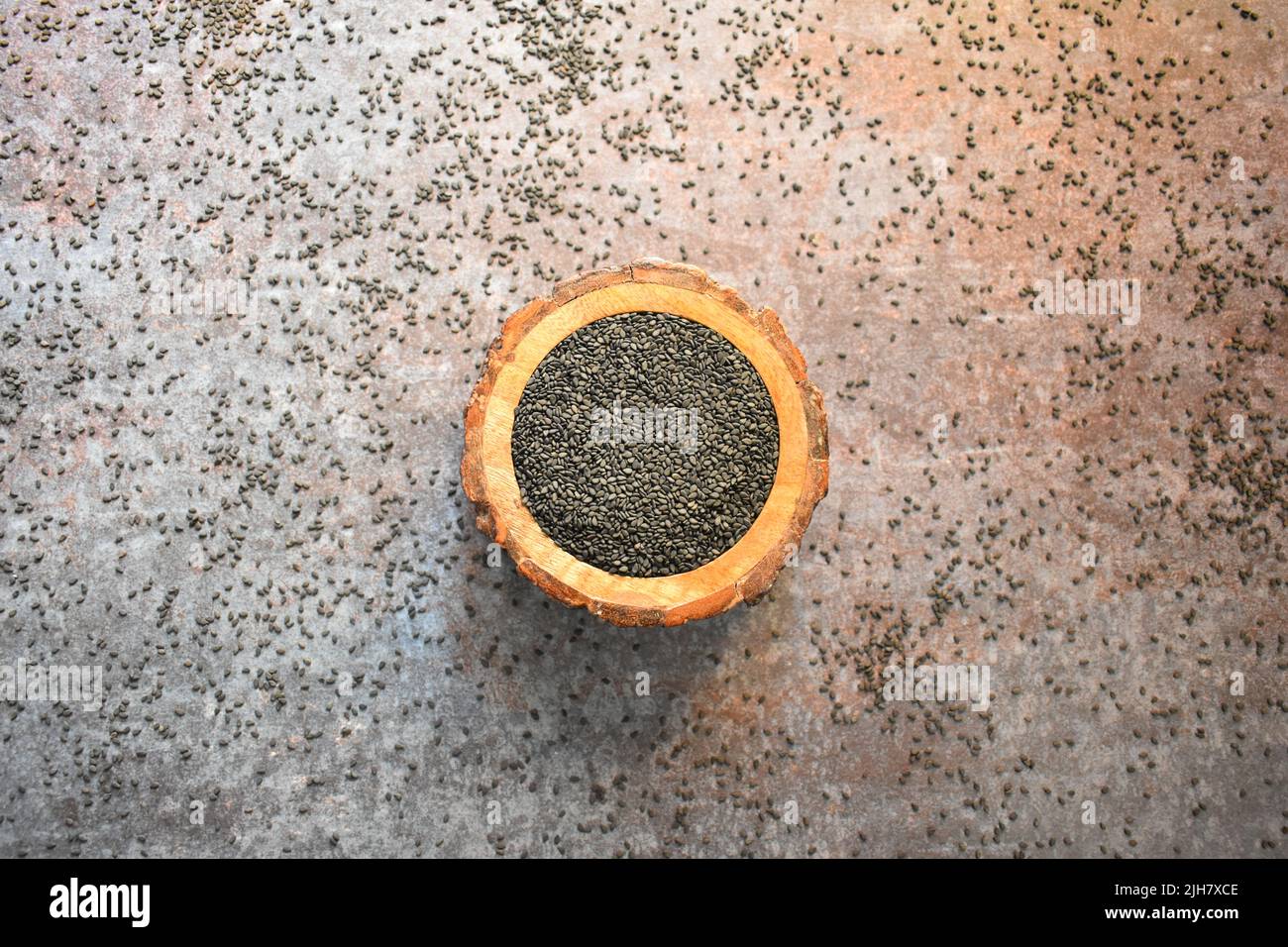 Raw whole dried black sesame seed Stock Photo Alamy
