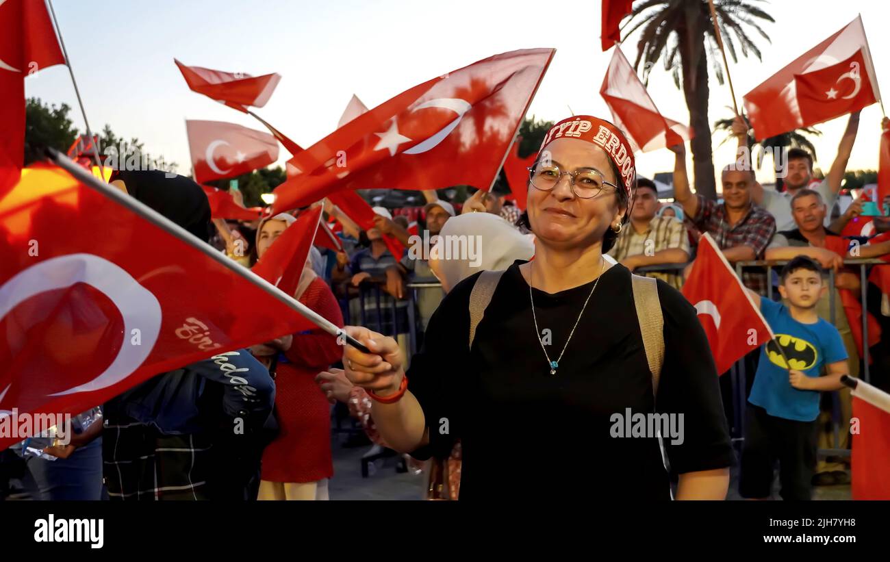 Izmir, Turkey. 15th July, 2022. People with Turkish flags, some of them with President Erdogan and Ottoman flag attended July 15 Democracy and National Unity Day's events to mark July 15 defeated coup's anniversary at Konak Square. 249 people were martyred and nearly 2,200 people injured in the defeated 15th of July 2016 coup attempt. (Photo by Idil Toffolo/Pacific Press) Credit: Pacific Press Media Production Corp./Alamy Live News Stock Photo