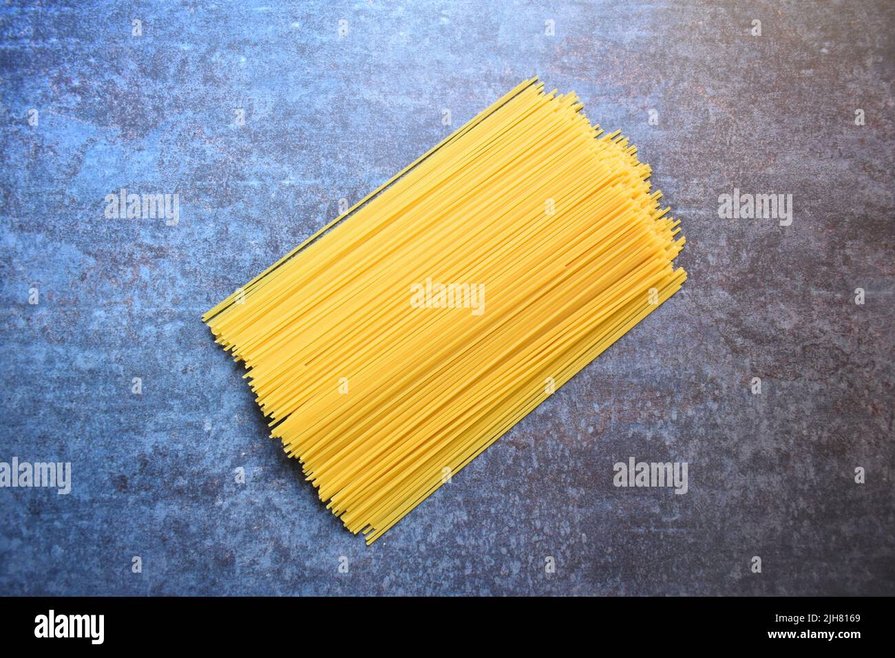 Raw whole dried Spaghetti pasta Stock Photo Alamy