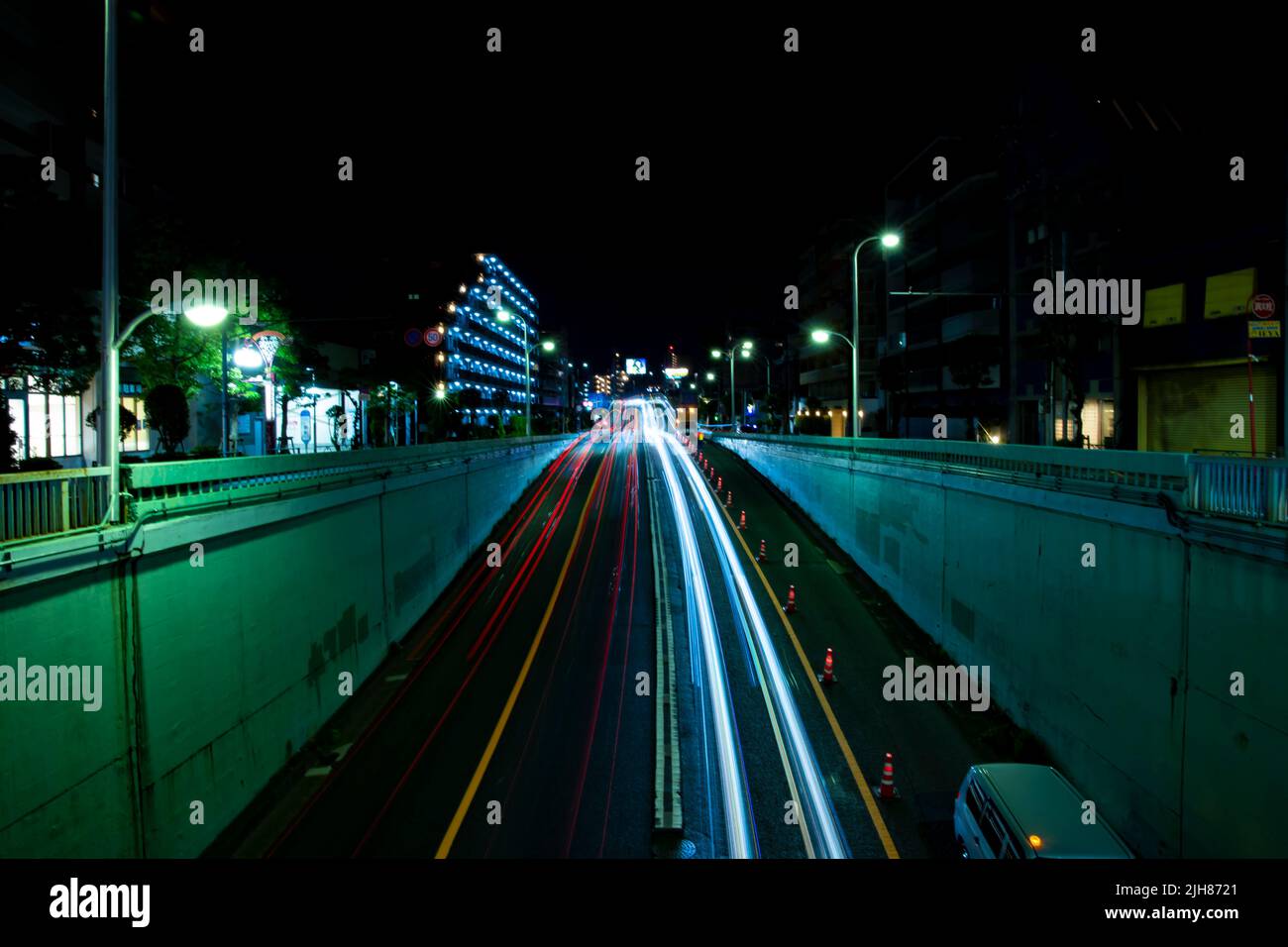 A night traffic jam at the urban street in Tokyo wide shot Stock Photo