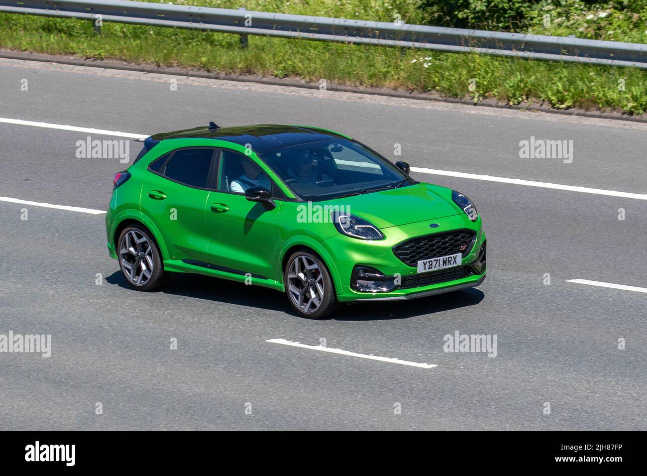 2022 Ford Puma ST green 1496cc petrol 6 speed manual; travelling on the M6  Motorway, Manchester, UK Stock Photo - Alamy