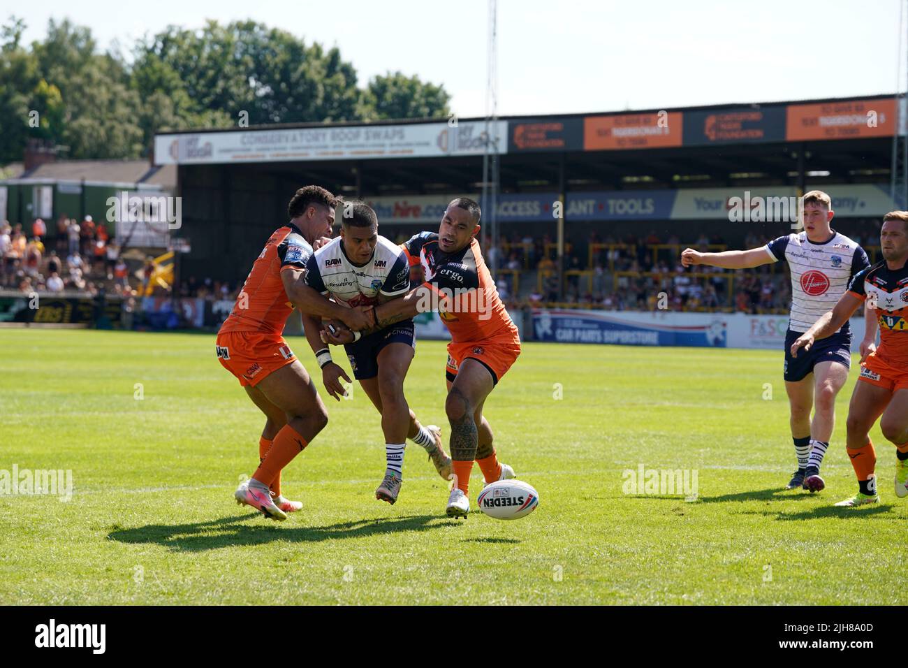 Castleford, UK. 16th July, 2022. Peter MataÕutia #3 of Warrington Wolves chips the ball behind the Castleford Tigers defence in Castleford, United Kingdom on 7/16/2022. (Photo by Steve Flynn/News Images/Sipa USA) Credit: Sipa USA/Alamy Live News Stock Photo