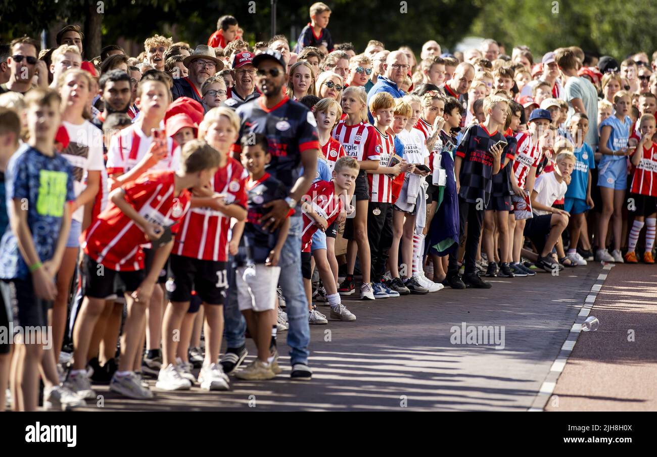 EINDHOVEN - PSV supporters during the annual PSV Fan Day at the Philips Stadium. After two years, the event can continue for fans. There is, among other things, a Walk of Fame where well-known PSV players are assigned a place during the tile ceremony. KOEN VAN WEEL Stock Photo