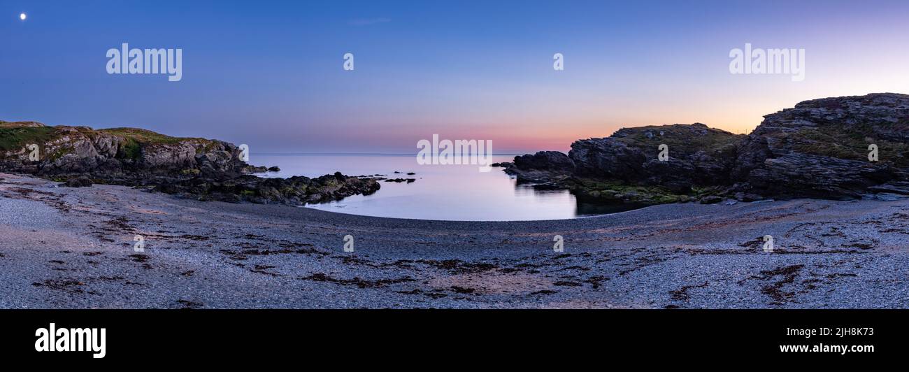Panoramic view of Trearddur Bay at dusk, Anglesey, North Wales Stock Photo