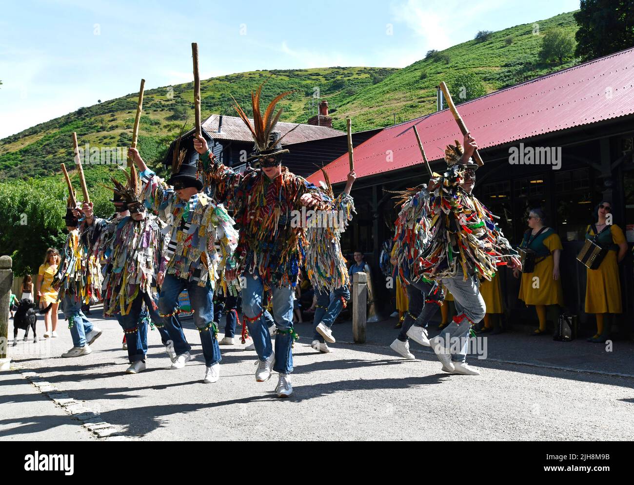 Carding Mill Valley, Church Stretton, Shropshire, Uk. July 16th 2022. The Stretton Hills were alive with the sound of music and dance when The Shropshire Bedlams and Martha Rhoden's Tuppenny Dish Border Morris dancers celebrated the groups 47th birthday in Carding Mill Valley, Church Stretton. Credit: Dave Bagnall /Alamy Live News Stock Photo