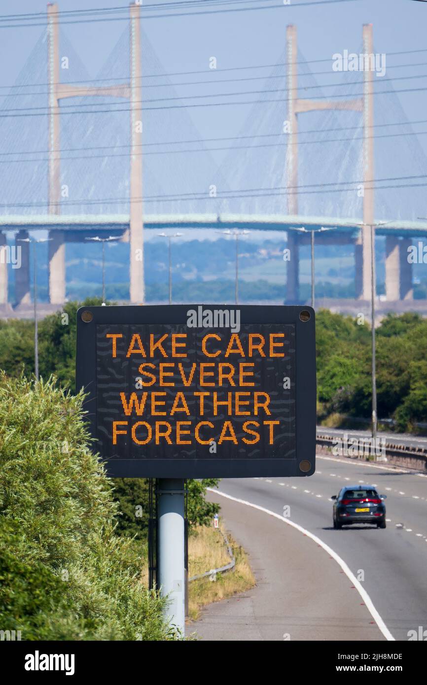 ROGIET, WALES - JULY 16: A sign on the M4 near the Prince of Wales Bridge warns motorists to take care due to the severe weather forecast on July 16, Stock Photo