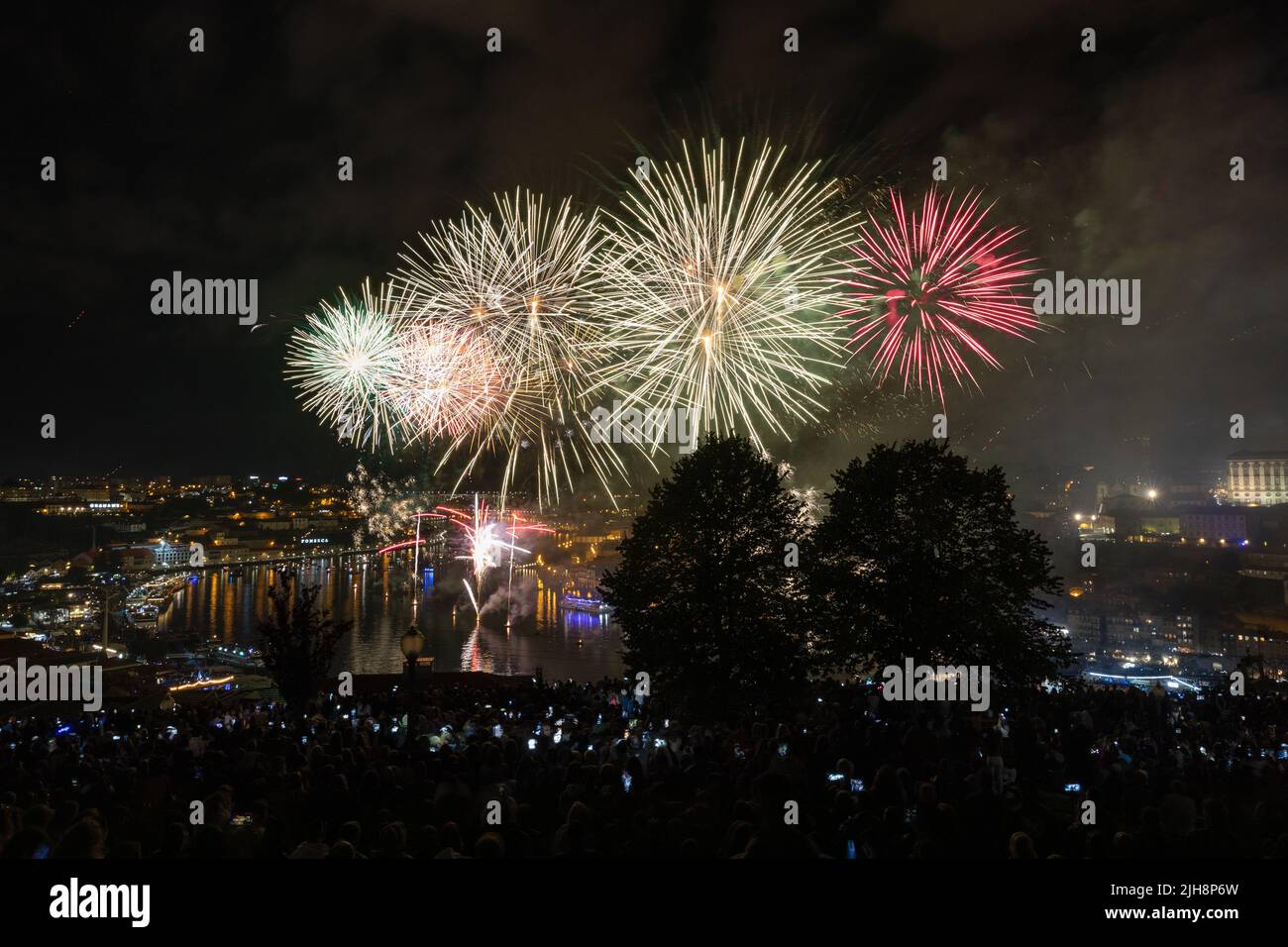 Fireworks on the Douro river in Porto, Portugal, celebrating Festas de São João - John the Baptist Stock Photo