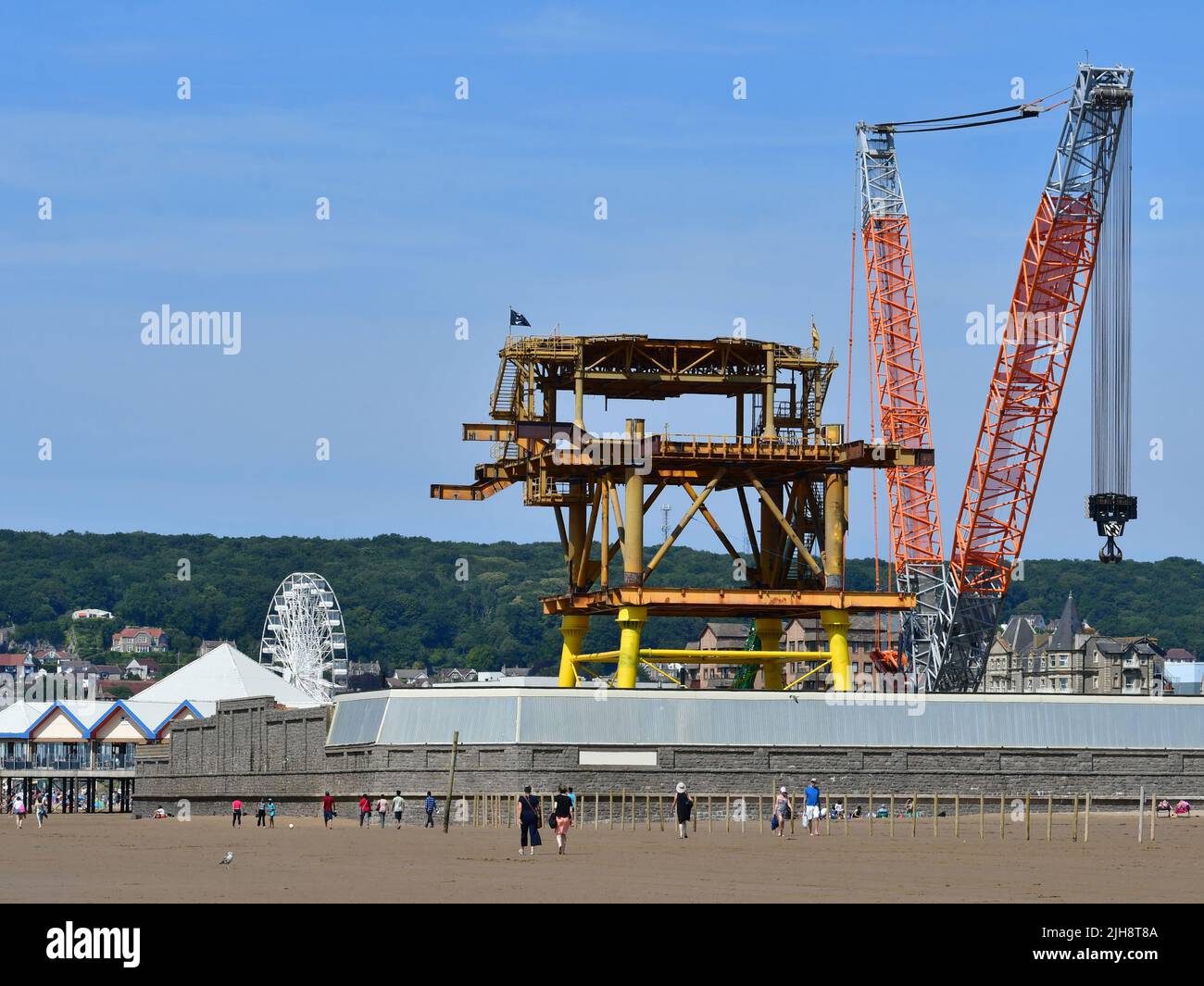 Weston Super Mare, UK. 16th July, 2022. UK Weston Super Mare a decommissioned oil rig is being assembled in the Tropicana on the seafront. This is a World first of its kind being transformed into green art work for tourist and visitor to look around when it soon opens to the public. Picture Credit: Robert Timoney/Alamy Live News Stock Photo