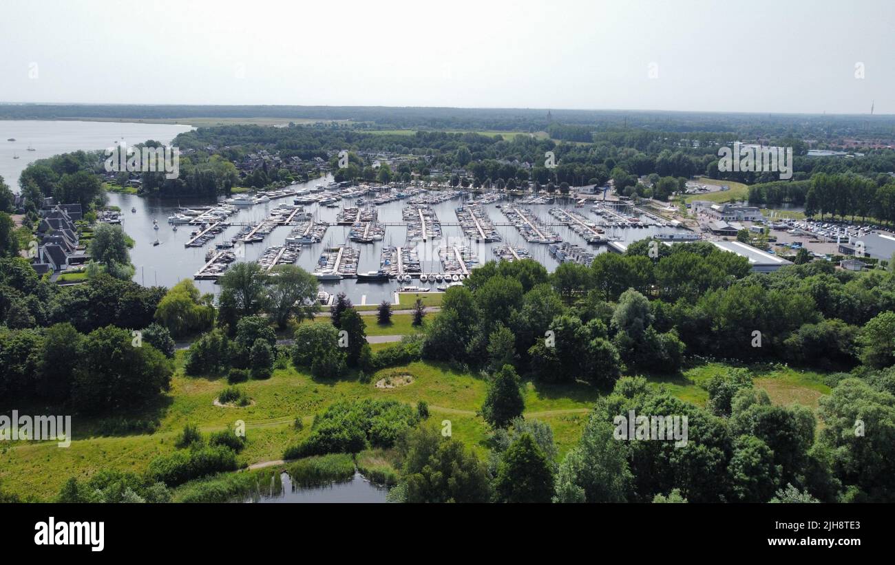 An aerial view of the marina with the sailing ship moored in the port ...