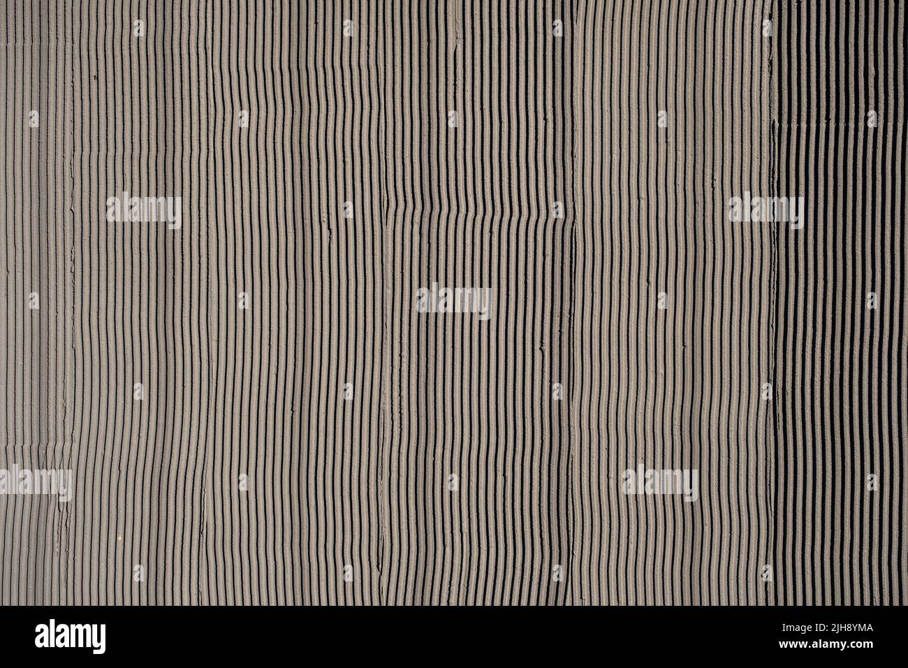 Raw concrete wall texture with formwork impression, grunge background Stock Photo