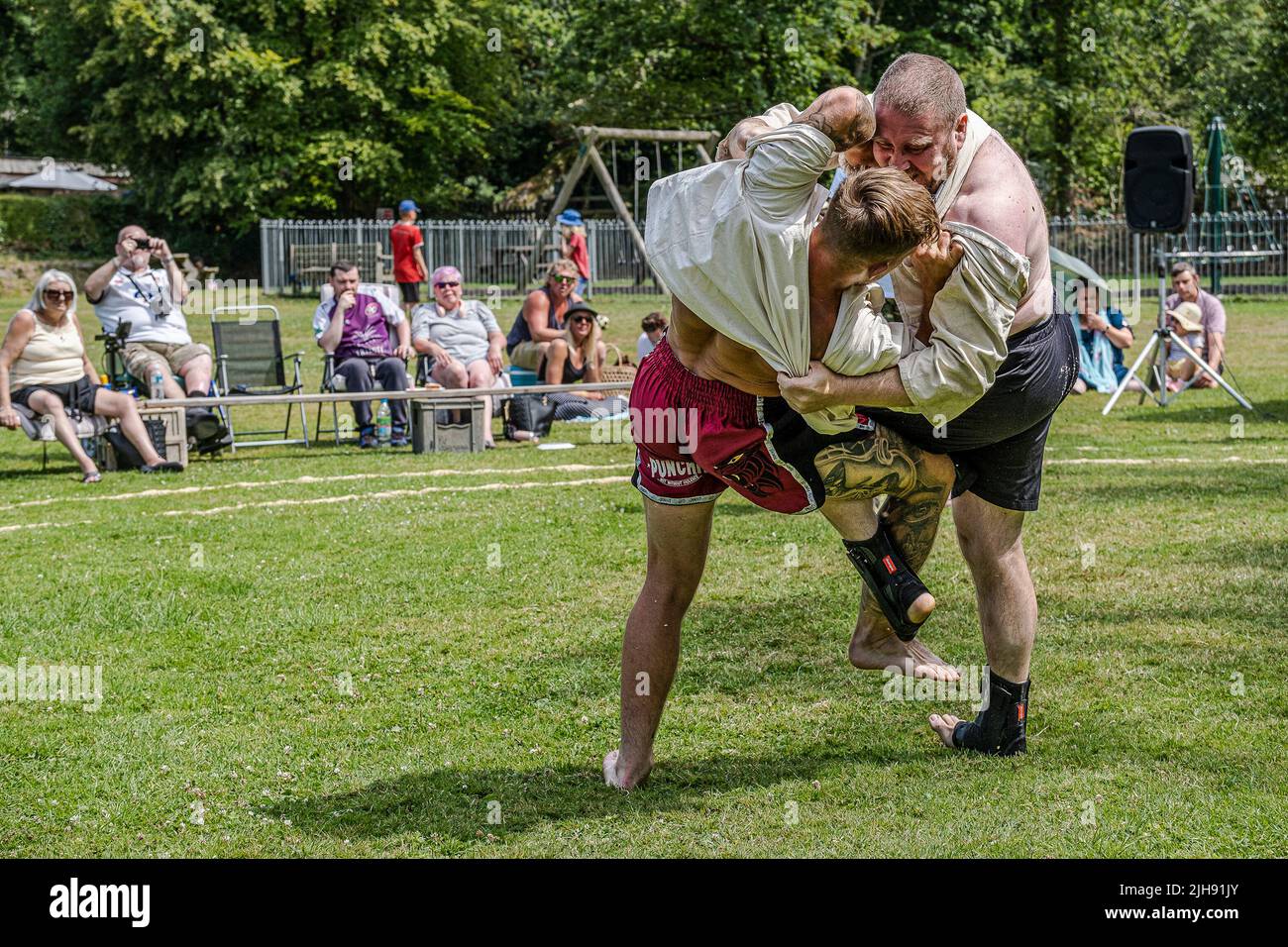 Newquay, Cornwall, UK. 16th Jul, 2020. Competitors in the first round of the Mens Open in the Grand Cornish Wrestling Tournament on the picturesque village green of St Mawgan in Pydar in Cornwall. Credit: Gordon Scammell/Alamy Live News Stock Photo
