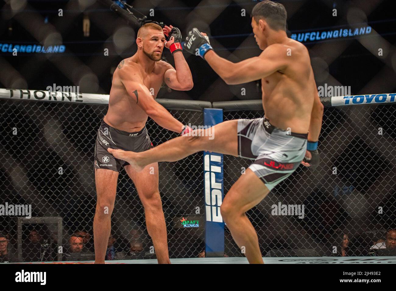 LONG ISLAND, NY JULY 16 (LR) Dustin Jacoby battles Jung Da Un in their Light Heavyweight