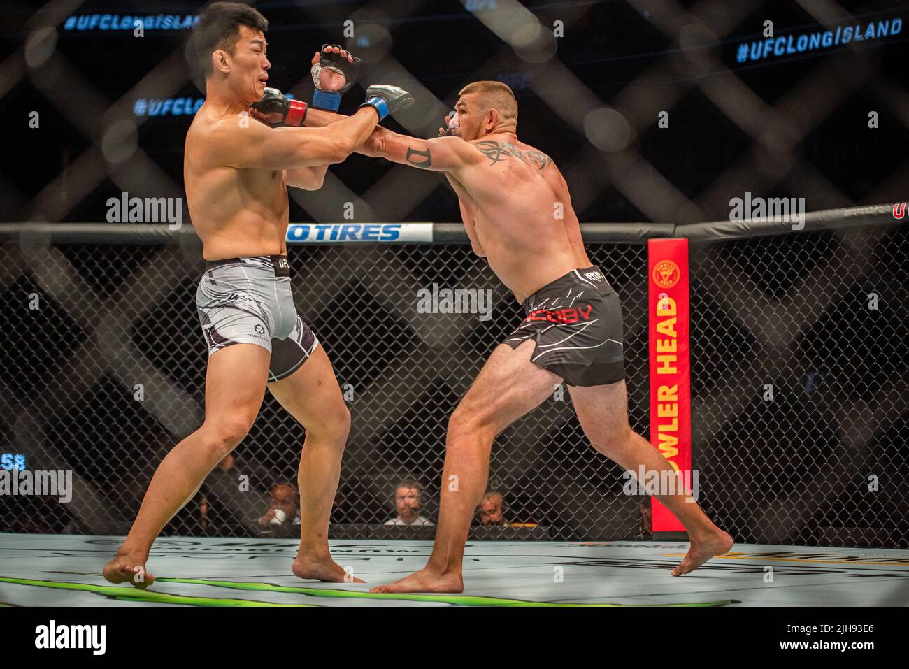 LONG ISLAND, NY JULY 16 (RL) Dustin Jacoby battles Jung Da Un in their Light Heavyweight