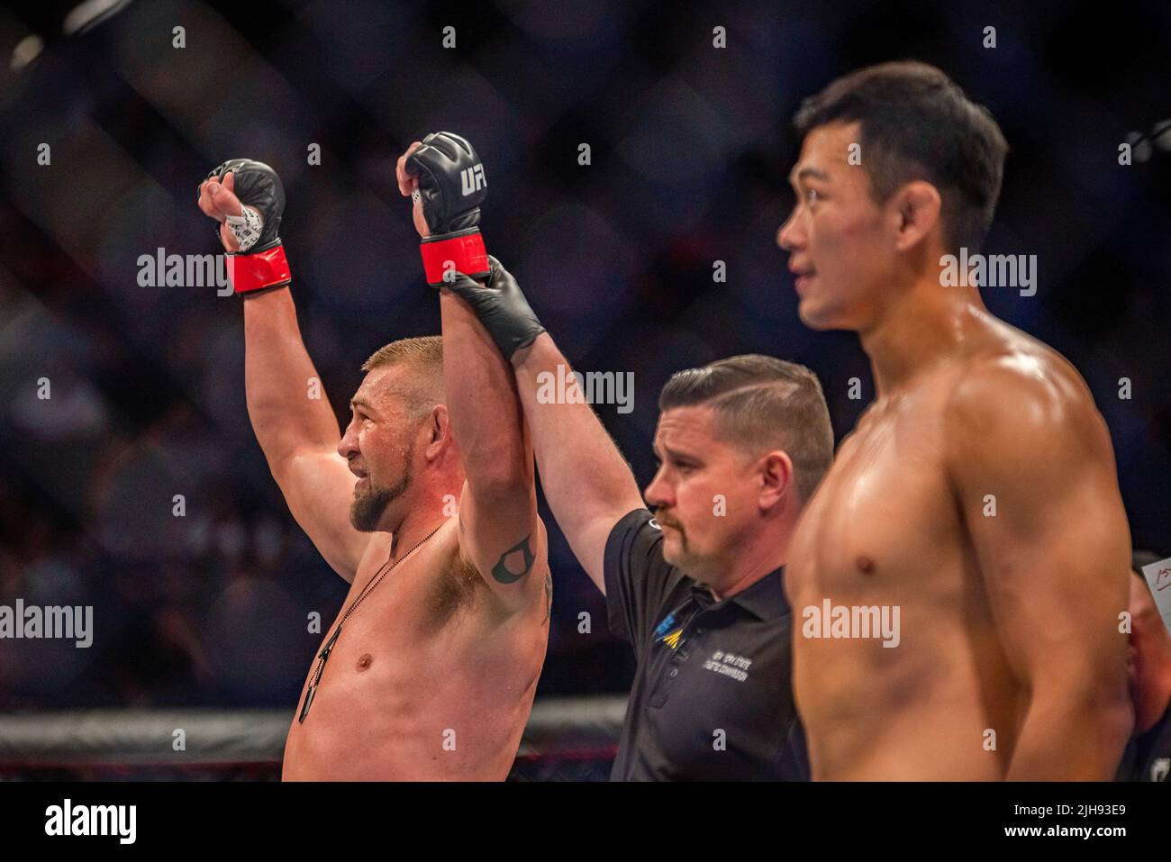 LONG ISLAND, NY JULY 16 (LR) Dustin Jacoby celebrates his victory over Jung Da Un in their
