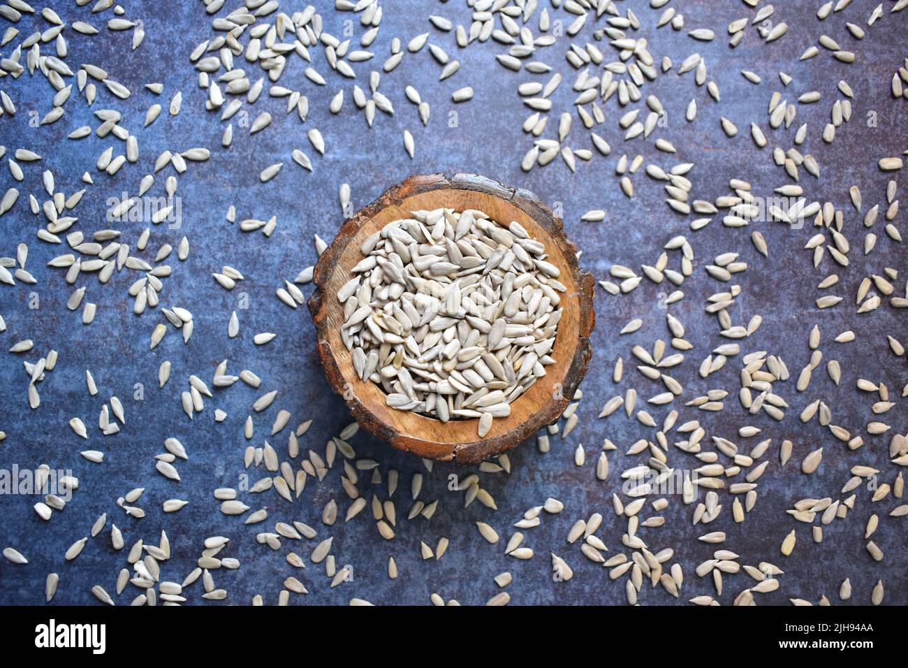 Raw whole dried hulled sunflower seeds Stock Photo Alamy
