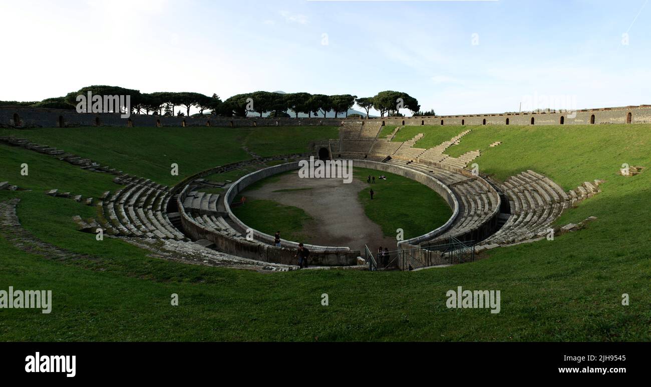 Overgrown view of the Theater of Pompeii in Italy. Stock Photo