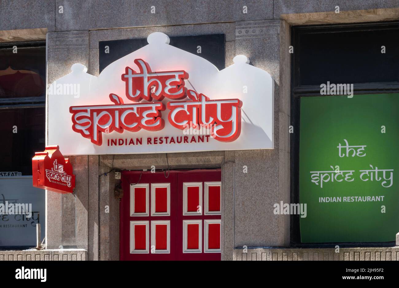 Sign over the entrance to The Spice City Indian restaurant in Liverpool Stock Photo