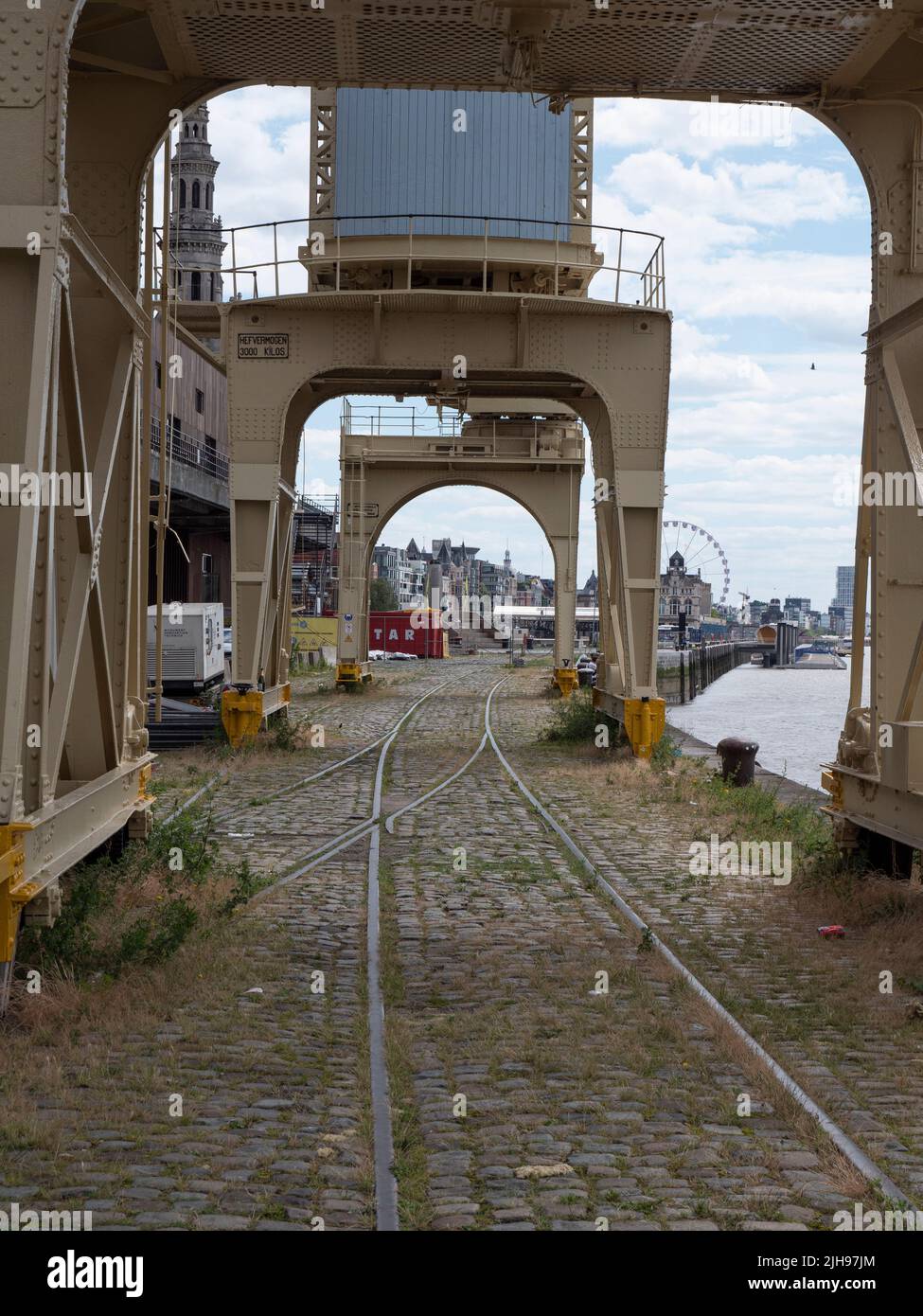 Antwerp, Belgium, 02 July 2022, the railway under the museum cranes on the right bank quay in Antwerp Stock Photo