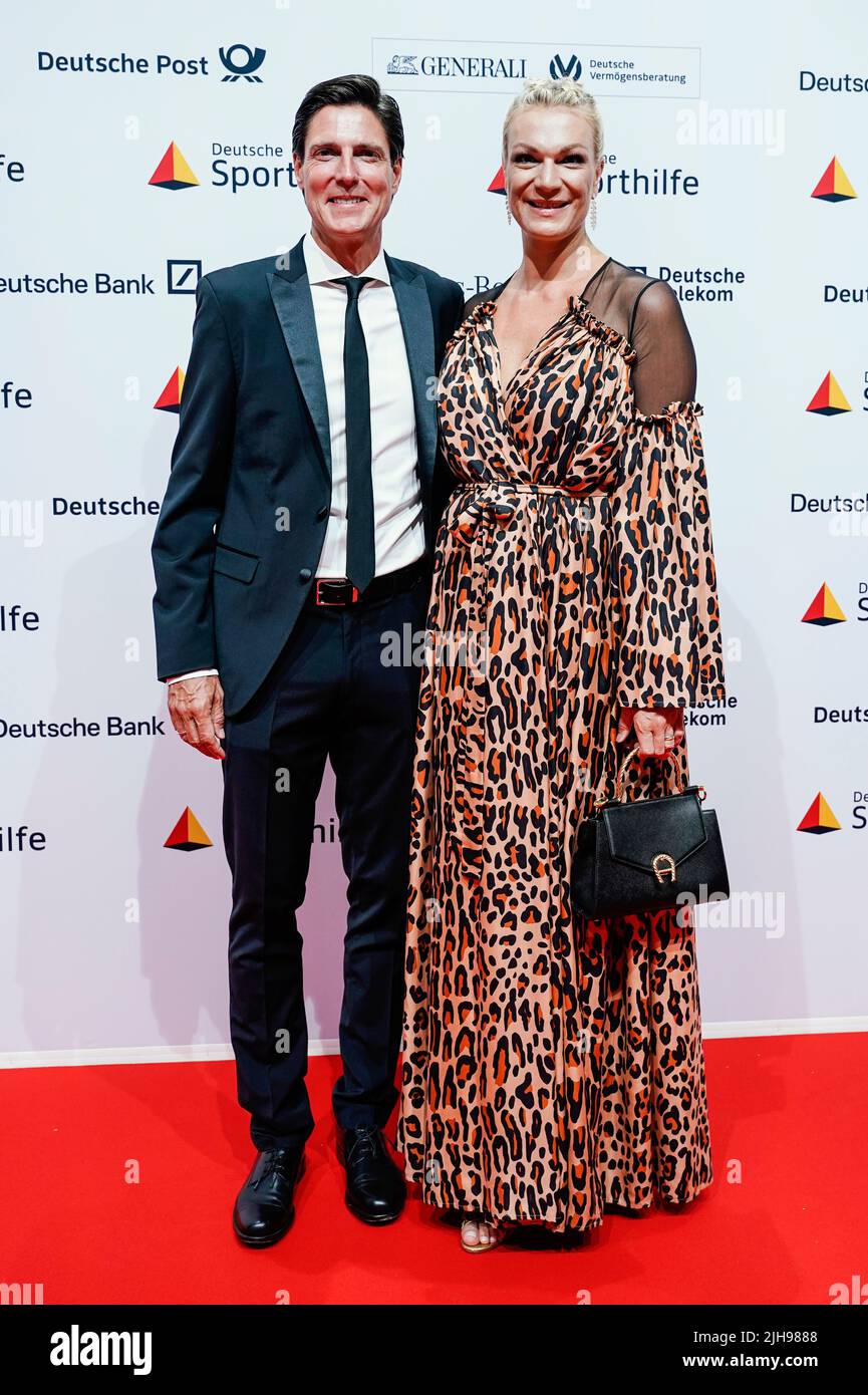 Wiesbaden, Germany. 16th July, 2022. Maria Höfl-Riesch and husband Marcus Höfl arrive at the 26th 'Ball des Sports' of the German Sports Aid Foundation at the RheinMain Congress Center. Credit: Uwe Anspach/dpa/Alamy Live News Stock Photo