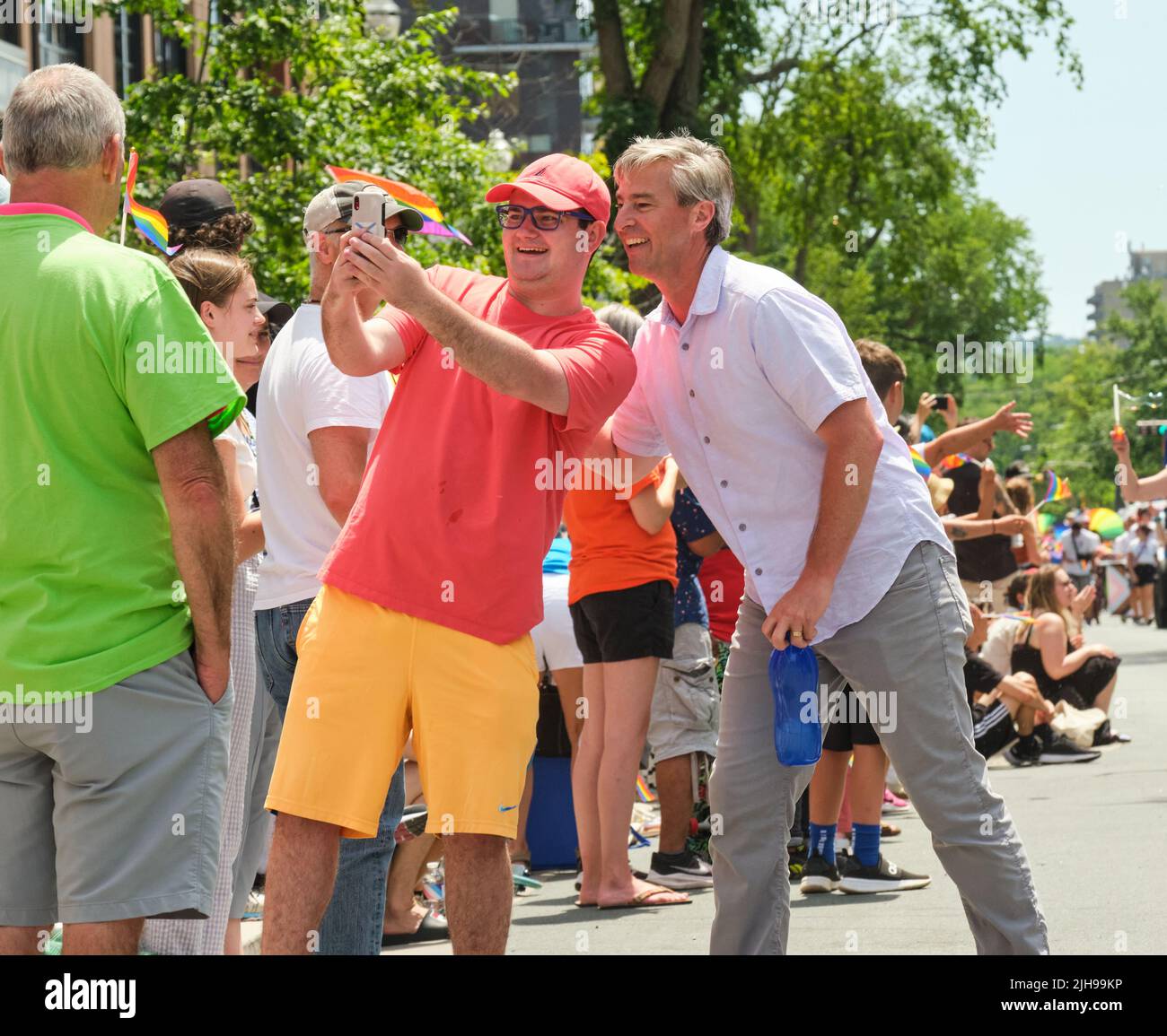Halifax, Canada. July 16th, 2022. Nova Scotia Premier Tim Houston posing for a selfie during the 2022 Halifax Pride Parade. The Parade returns through the street of the city after two years absence. Credit: meanderingemu/Alamy Live News Stock Photo