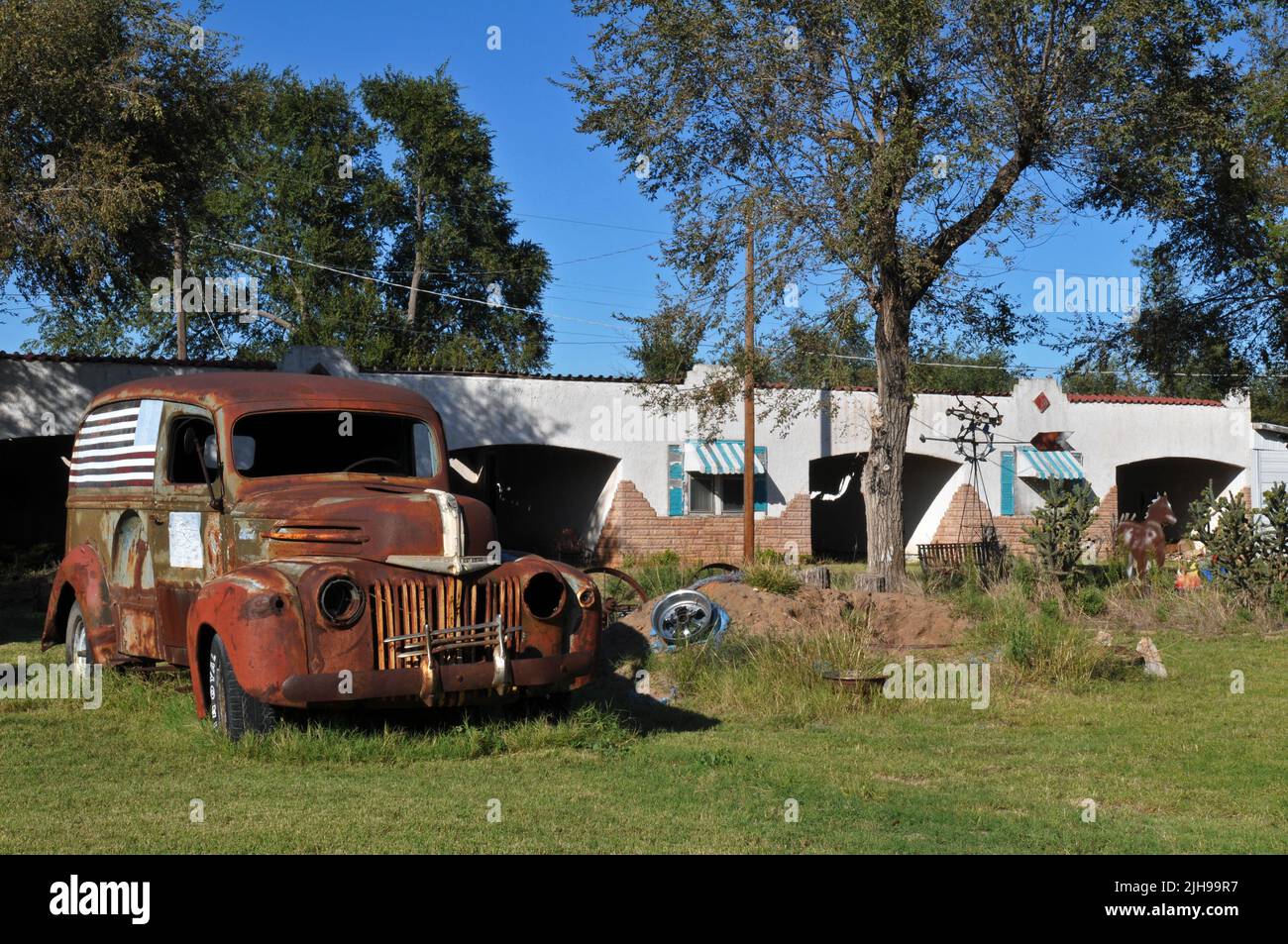 An old panel truck sits at the former West Winds Motel in the small Route 66 city of Erick, Oklahoma. Stock Photo