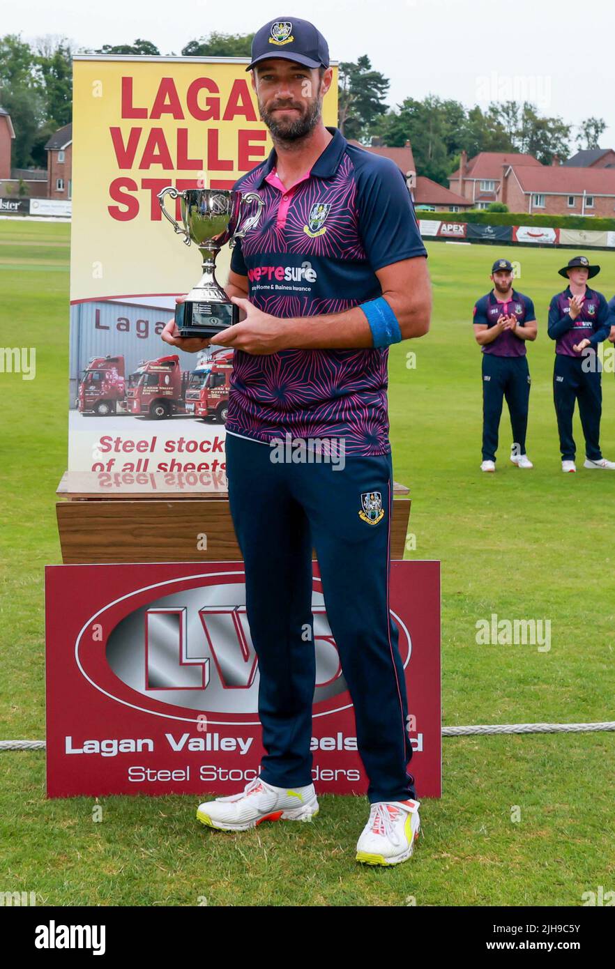 The Lawn, Waringstown, Northern Ireland, UK. 16 Jul 2022. The Lagan Valley Steels Twenty 20 Cup Final 2022. CIYMS v CSNI – CIYMS won by 16 runs (DLS) in a rain-affected match. CIYMD captain Nigel Jones with the Lagan Valley Steel T20 Cup. Credit: David Hunter/Alamy Live News Stock Photo