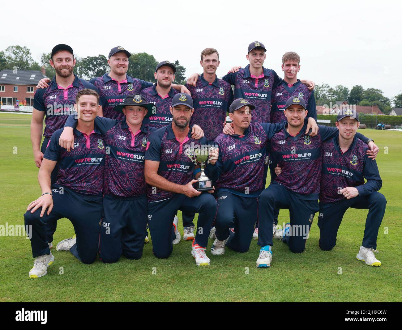 The Lawn, Waringstown, Northern Ireland, UK. 16 Jul 2022. The Lagan Valley Steels Twenty 20 Cup Final 2022. CIYMS v CSNI – CIYMS won by 16 runs (DLS) in a rain-affected match. CIYMS celebrate their win. Credit: David Hunter/Alamy Live News Stock Photo