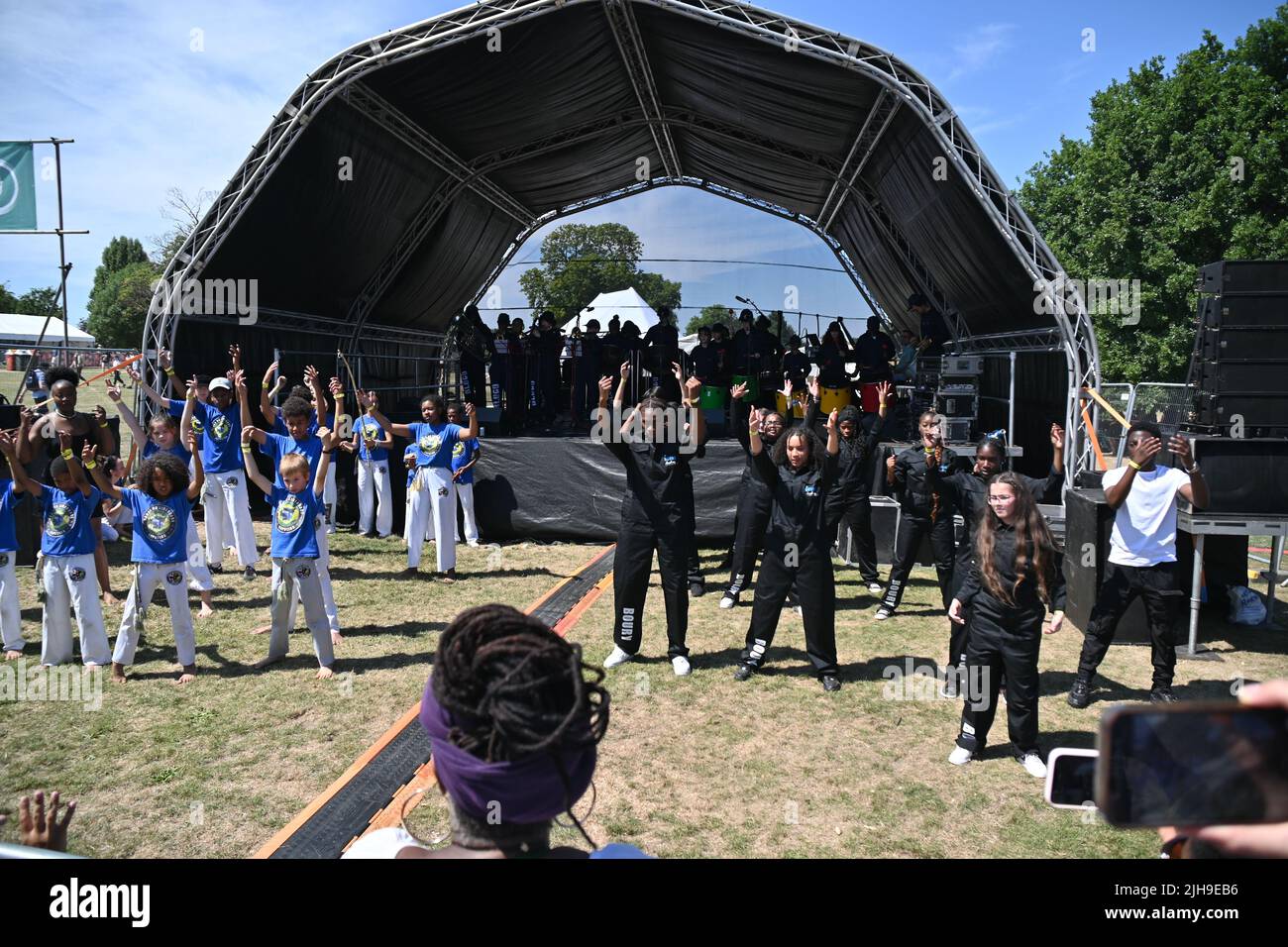 London, UK. 16th July, 2022. Danca Da Liberdade Capoeira School performs at the Lambeth Country Show 2022  a family festival with live music food & drinks, Arts and Culture at Brockwell Park, London, UK. - 16 July 2022. Credit: See Li/Picture Capital/Alamy Live News Stock Photo