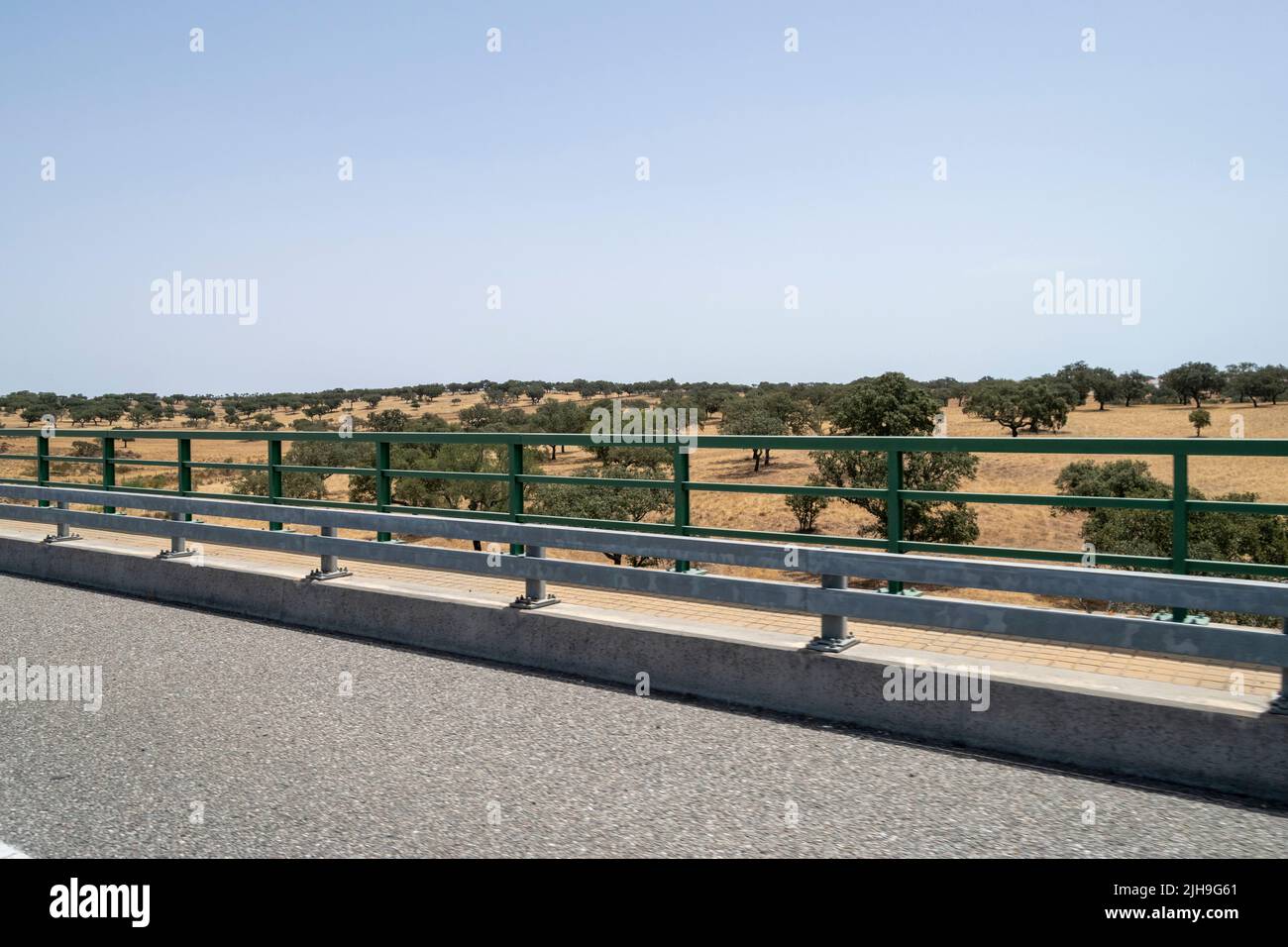 Driving trough Alentejo on summer. Hot days in South Portugal. Driving on A2 highway. Autoestrada A2. Rural South Portugal. Climate changes, water issues Stock Photo