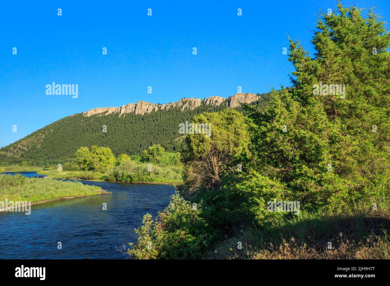 clark fork river below cliffs near drummond, montana Stock Photo