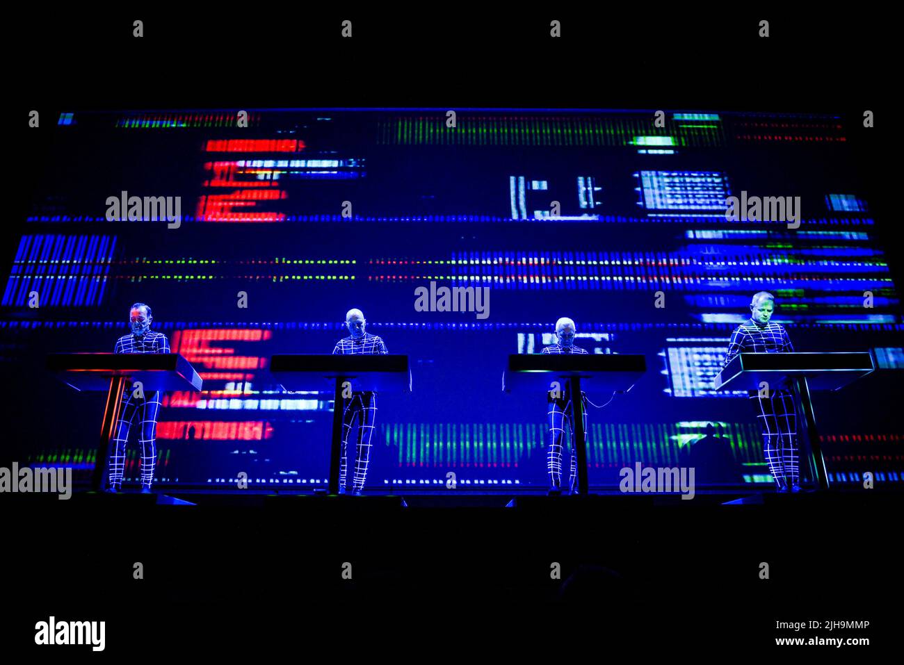 Electronic music pioneers Kraftwerk perform live on stage at Arlene