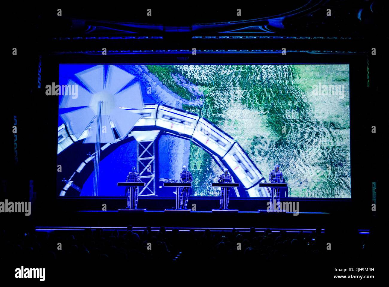 Electronic music pioneers Kraftwerk perform live on stage at Arlene