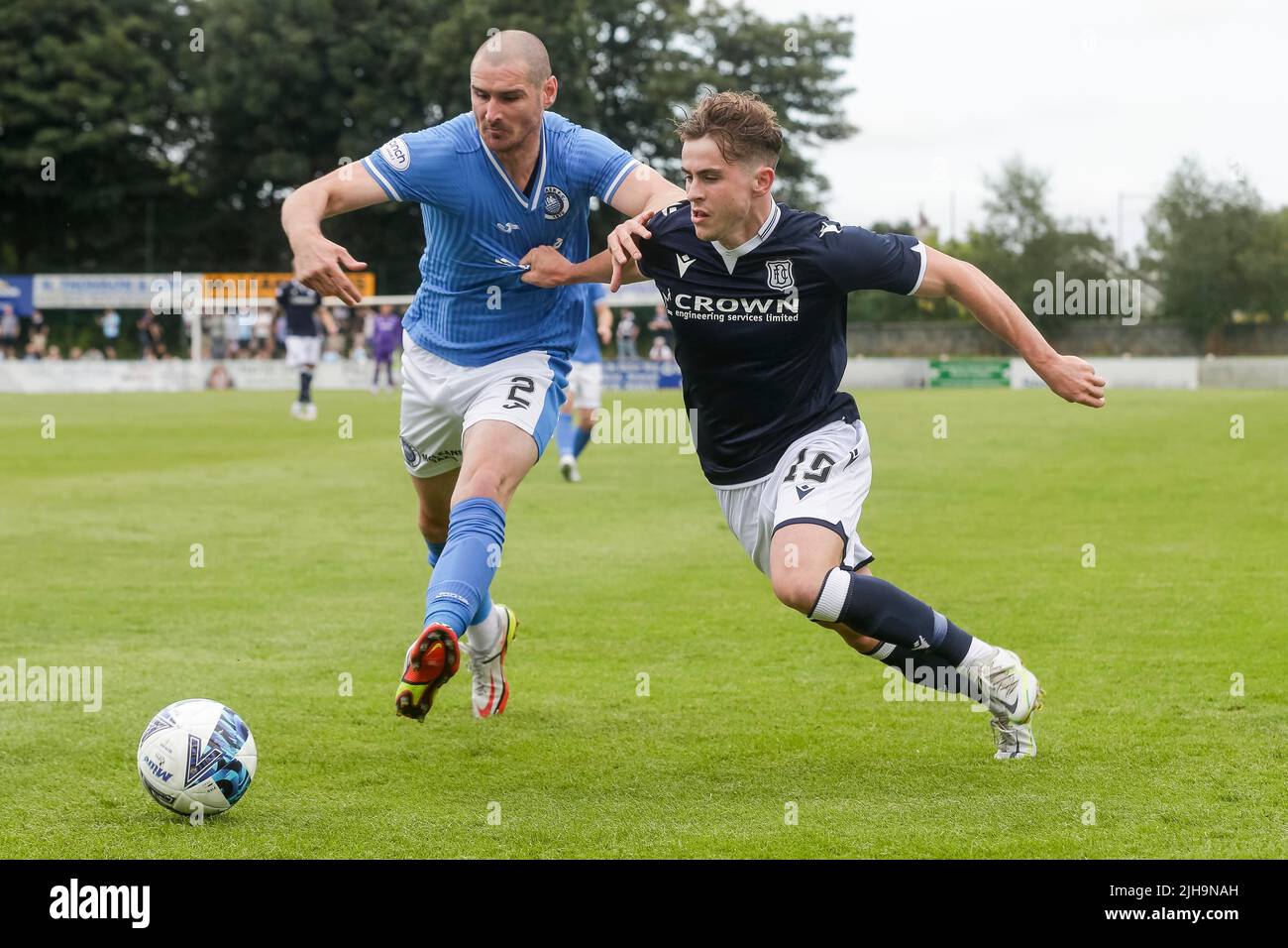 16th July 2022,  Stair Park, Stranraer, Scotland: Scottish League cup football Stranraer FC versus Dundee FC; Finlay Robertson of Dundee challenges for the ball with Scott Robertson of Stranraer Stock Photo