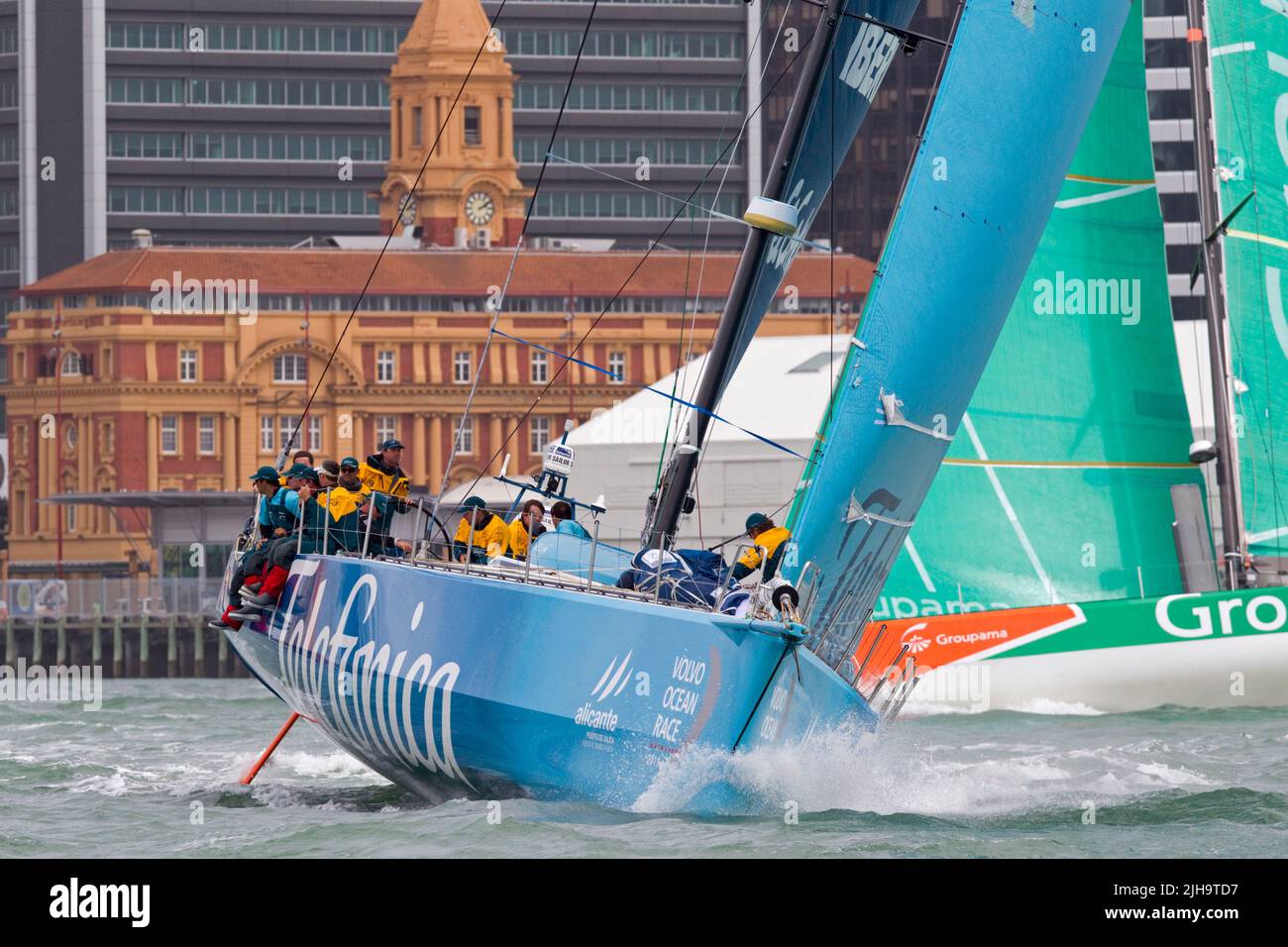 Team Telefonica followed by Groupama Sailing Team depart the harbour for leg 5 to Itajai, Brazil as part of the Volvo Ocean Race, Auckland, New Zealan Stock Photo