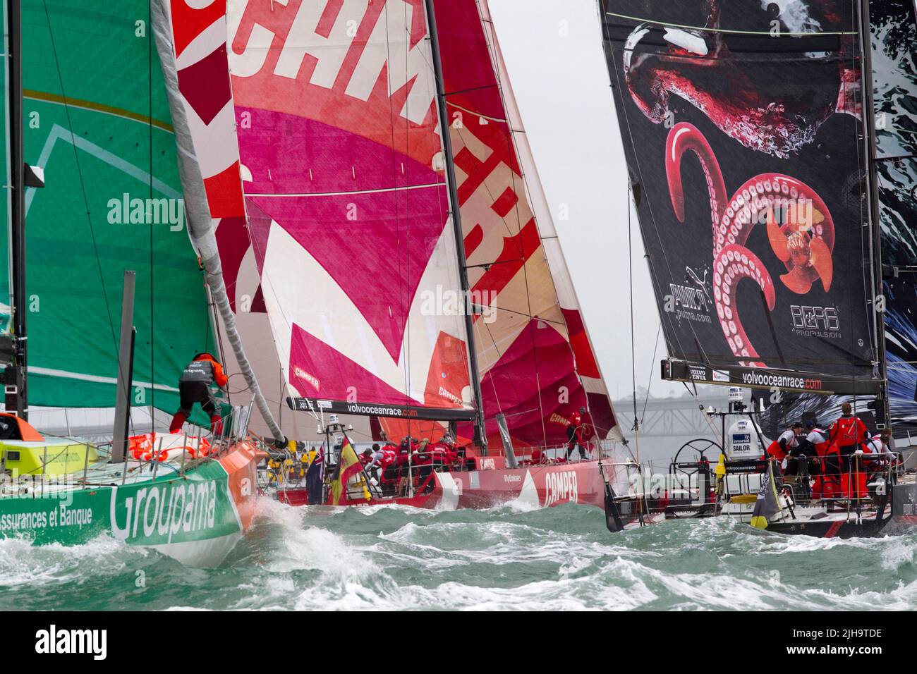 Groupama Sailing Team, left, Camper with Emirates Team New Zealand and Puma Ocean Racing depart the harbour for leg 5 to Itajai, Brazil as part of the Stock Photo