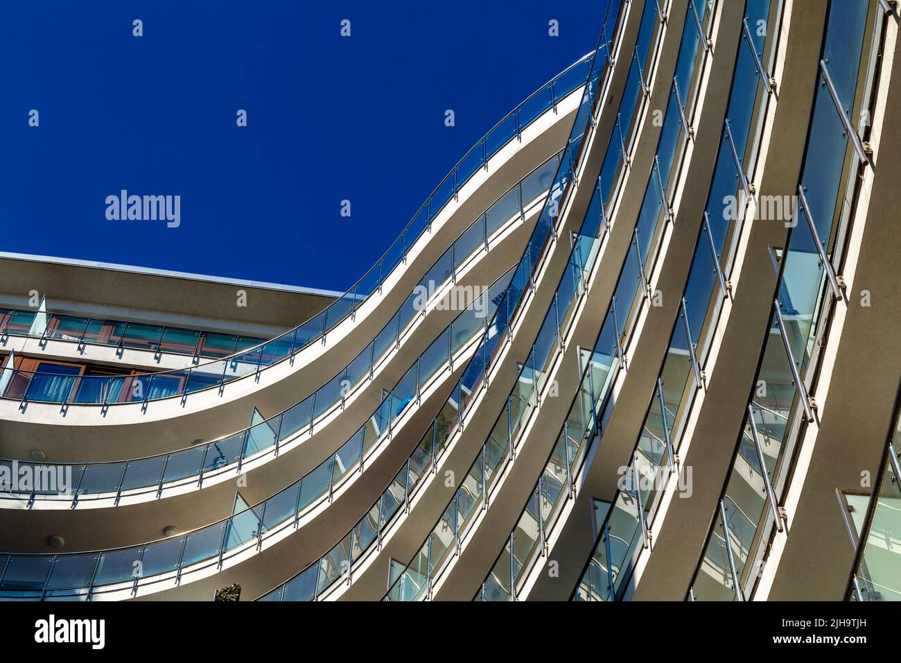 Wavy and flowing exterior of Solec 24 apartment complex in Solec, Warsaw, Poland Stock Photo