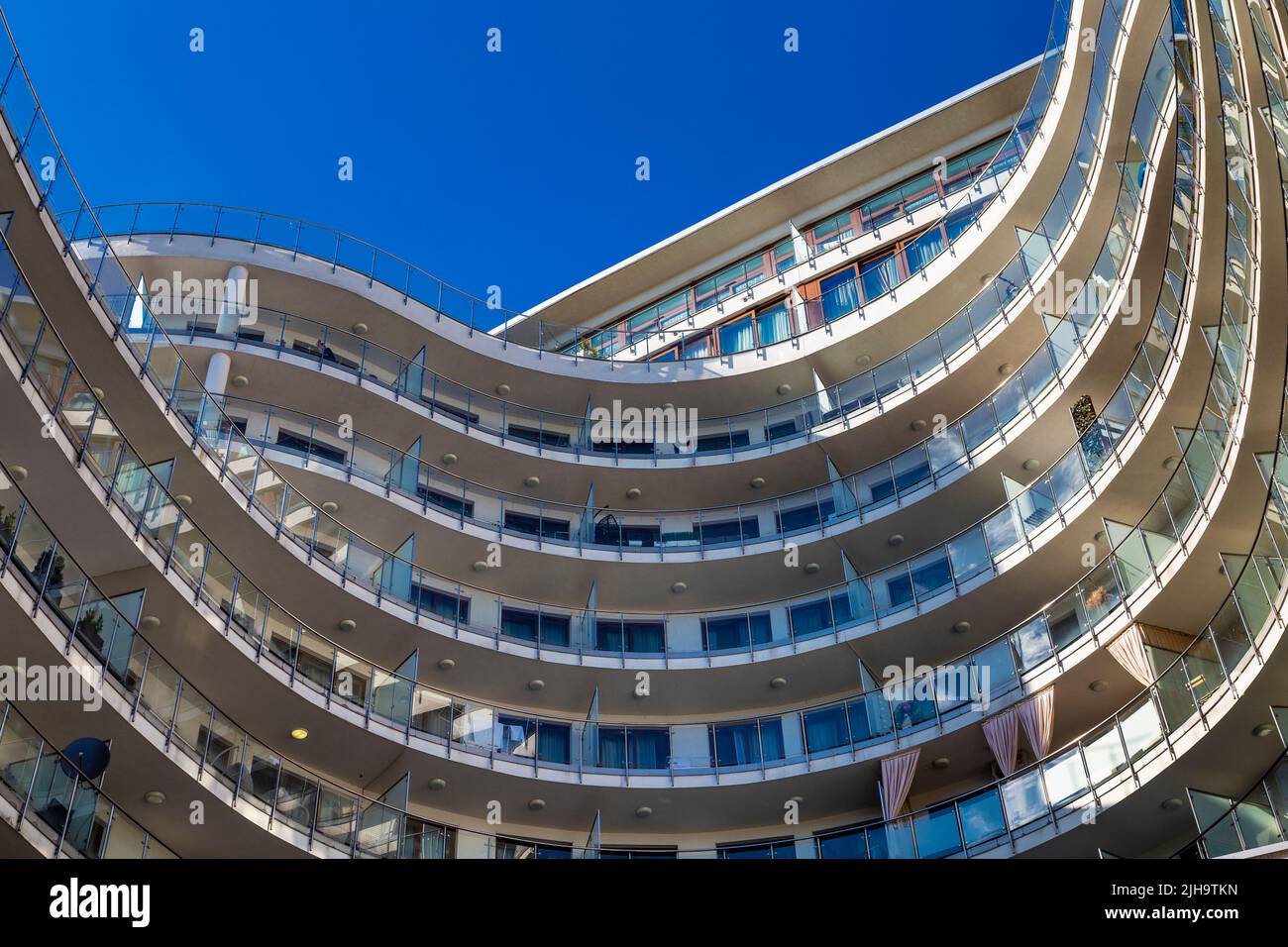 Wavy and flowing exterior of Solec 24 apartment complex in Solec, Warsaw, Poland Stock Photo