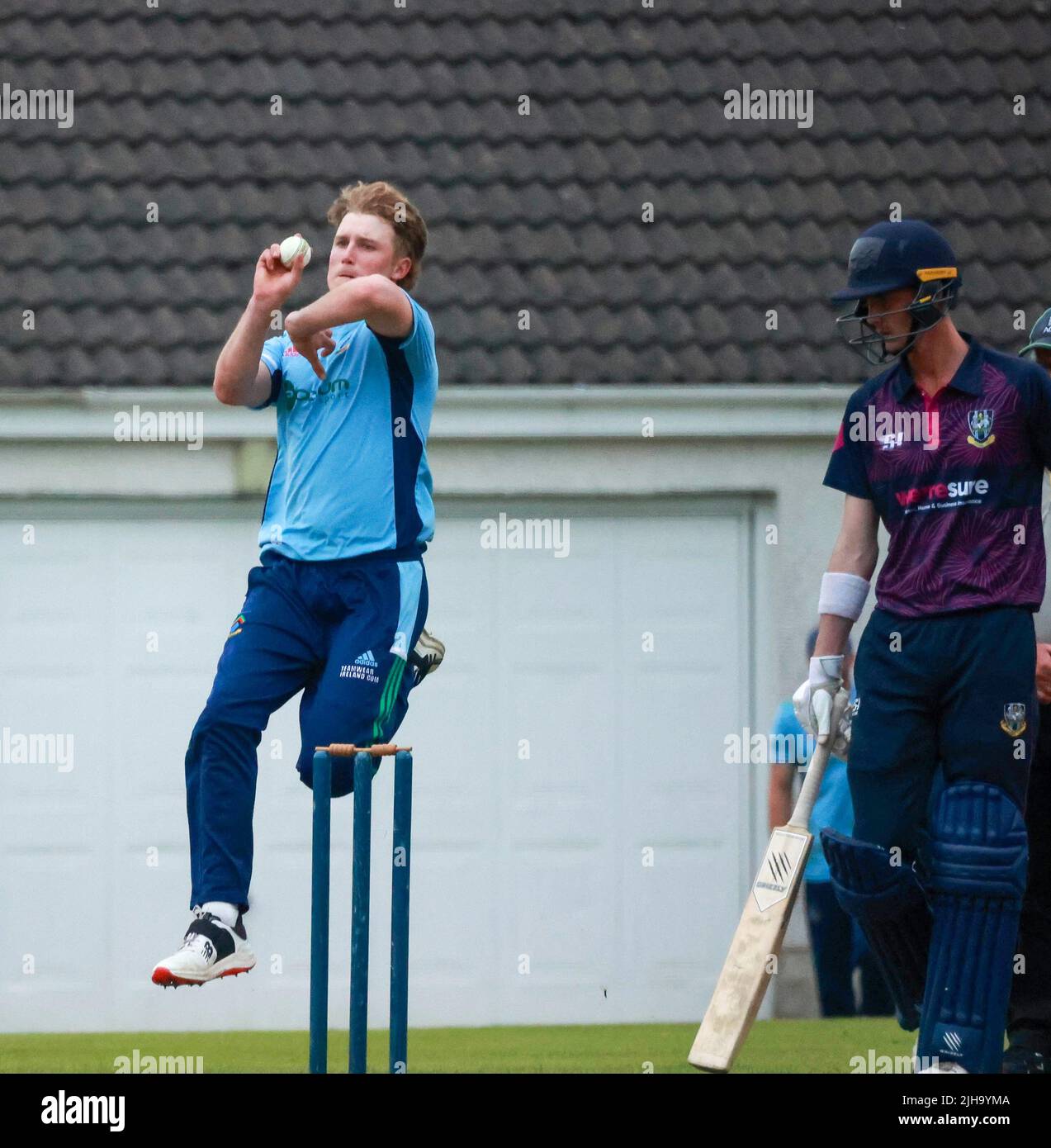 The Lawn, Waringstown, Northern Ireland, UK. 16 Jul 2022. The Lagan Valley Steels Twenty 20 Cup Final 2022. CIYMS v CSNI – CIYMS won by 16 runs (DLS) in a rain-affected match. CSNI bowler in action. Credit: David Hunter/Alamy Live News. Stock Photo