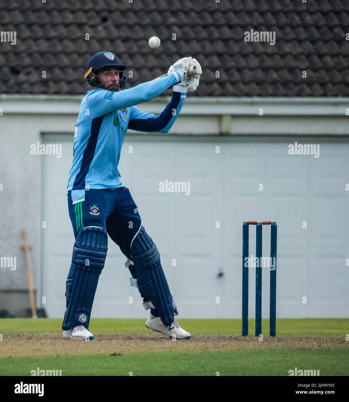 The Lawn, Waringstown, Northern Ireland, UK. 16 Jul 2022. The Lagan Valley Steels Twenty 20 Cup Final 2022. CIYMS v CSNI – CIYMS won by 16 runs (DLS) in a rain-affected match. Eyes on the ball from the CSNI batter as the ball rises sharply over the stumps. Credit: David Hunter/Alamy Live News. Stock Photo