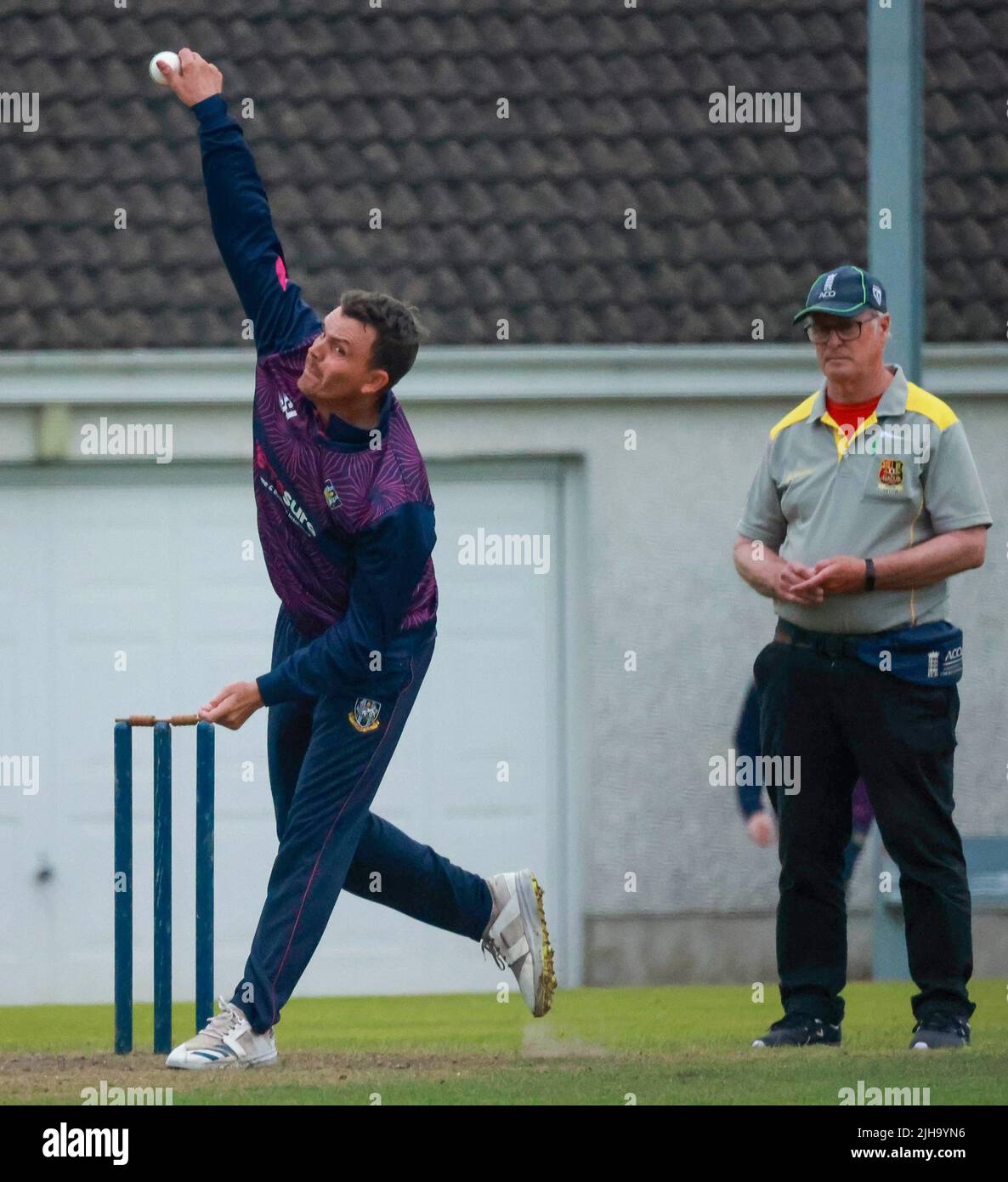 The Lawn, Waringstown, Northern Ireland, UK. 16 Jul 2022. The Lagan Valley Steels Twenty 20 Cup Final 2022. CIYMS v CSNI – CIYMS won by 16 runs (DLS) in a rain-affected match. CIYMS bowler in action in today's final. Credit: David Hunter/Alamy Live News. Stock Photo