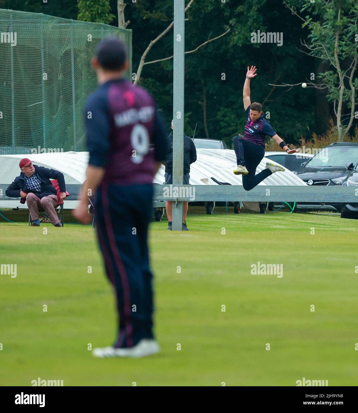 The Lawn, Waringstown, Northern Ireland, UK. 16 Jul 2022. The Lagan Valley Steels Twenty 20 Cup Final 2022. CIYMS v CSNI – CIYMS won by 16 runs (DLS) in a rain-affected match. Six runs for CSNI ans this CIYMS fielder was unable to get a hand on a fierce drive. Credit: David Hunter/Alamy Live News. Stock Photo